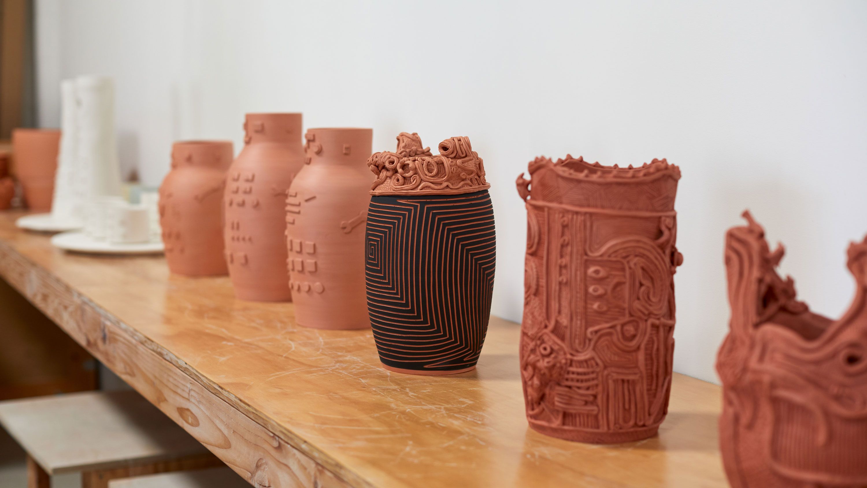 New works by Shio Kusaka are displayed on a shelf in the artist’s studio. Photo by Ye Rin Mock