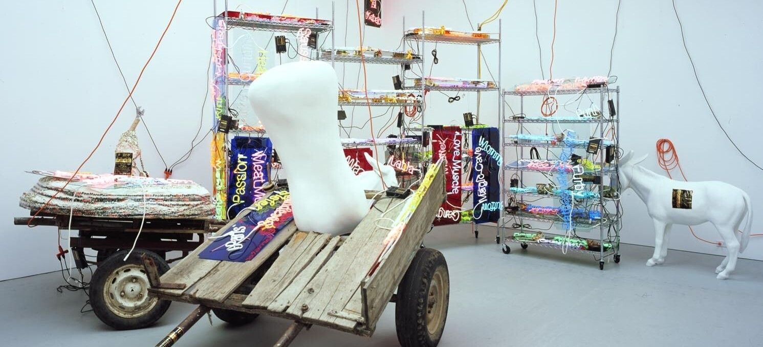An installation view of the exhibition Jason Rhoades: Meccatuna, at David Zwirner New York, dated 2003.