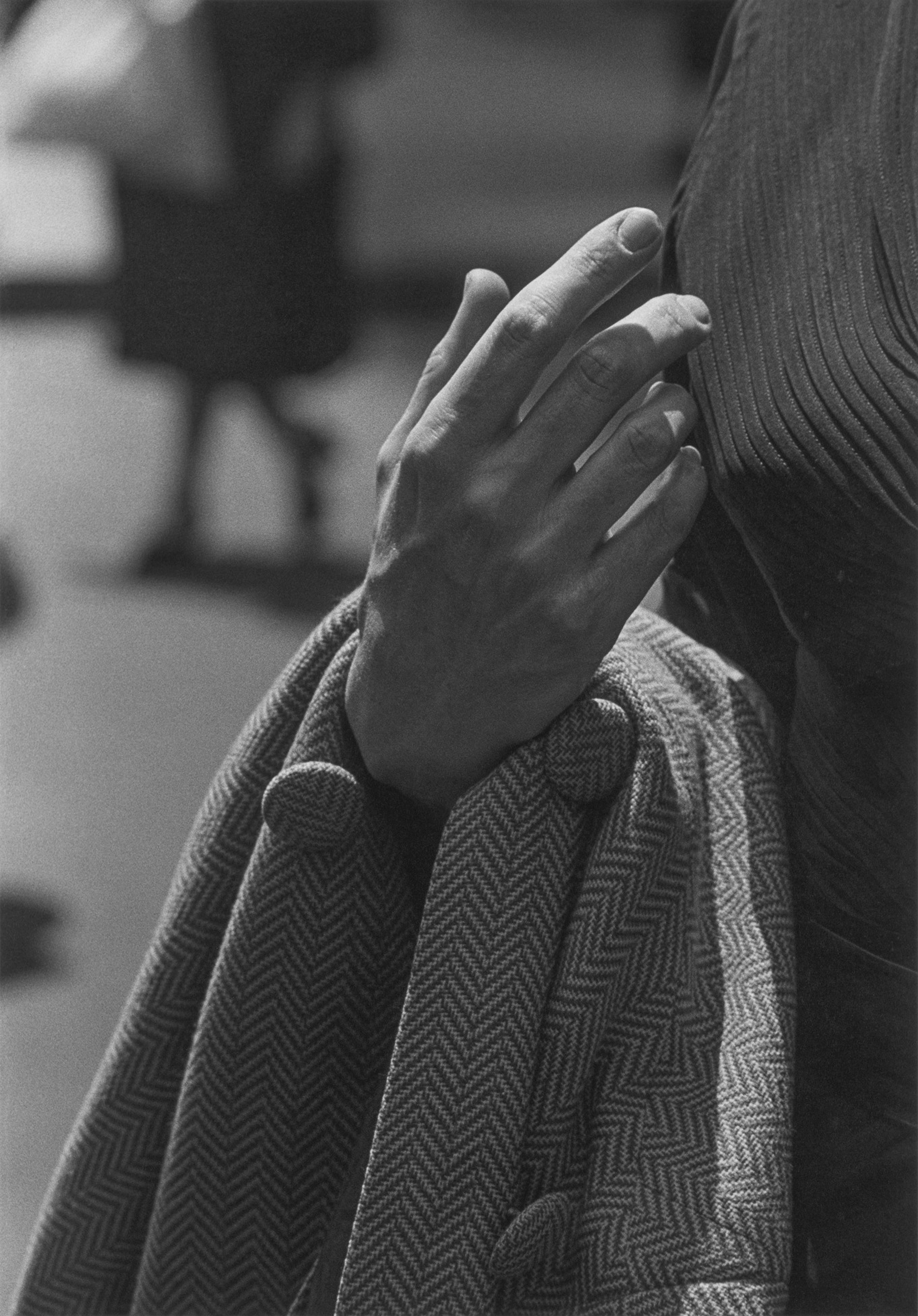 A photograph by Roy de Carava titled Hand and coat, dated 1962.