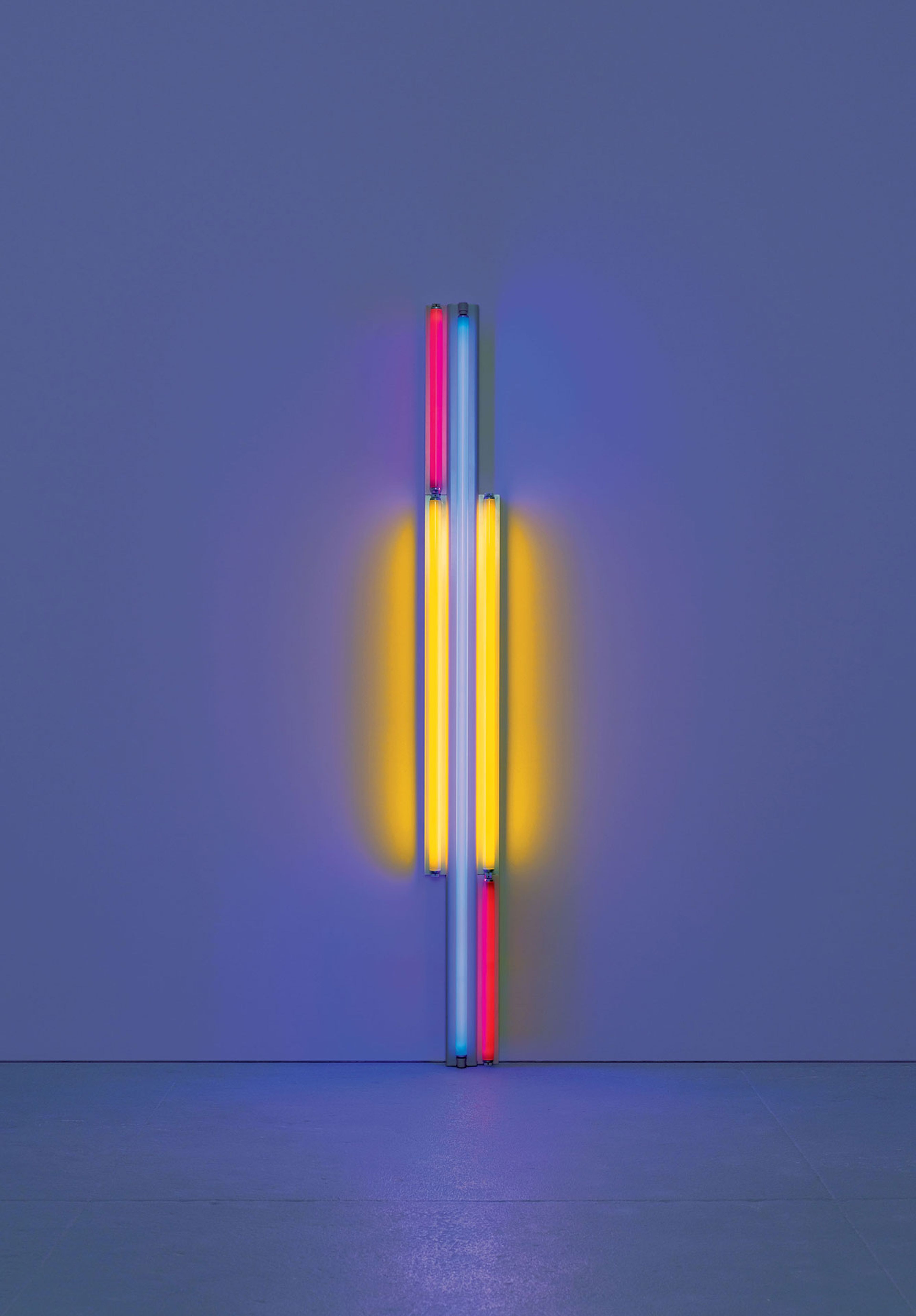 A sculpture in red, yellow, and blue fluorescent light by Dan Flavin, titled untitled (to Piet Mondrian), dated 1985.