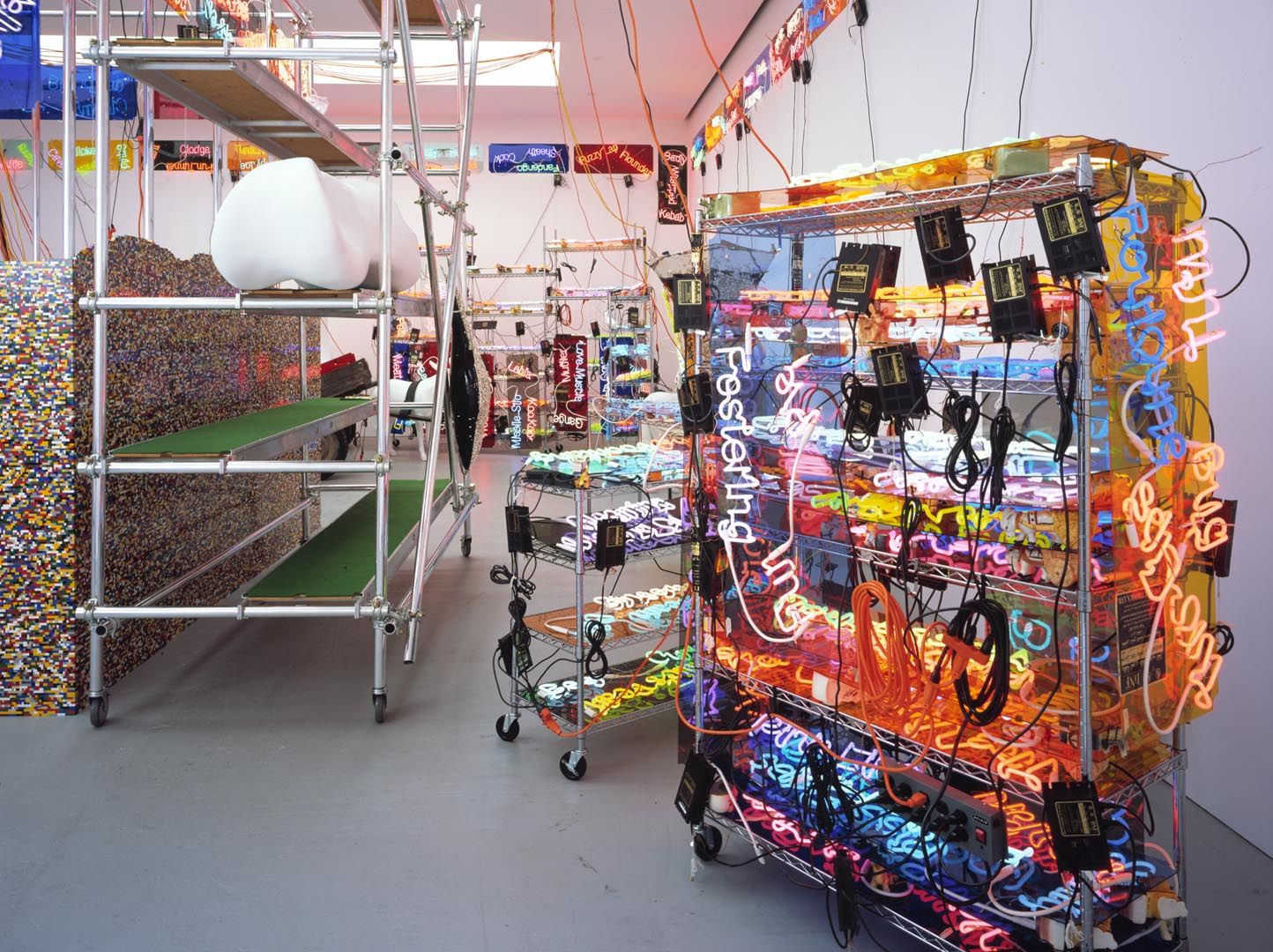 An installation view of the exhibition Jason Rhoades: Meccatuna, at David Zwirner New York, dated 2003.