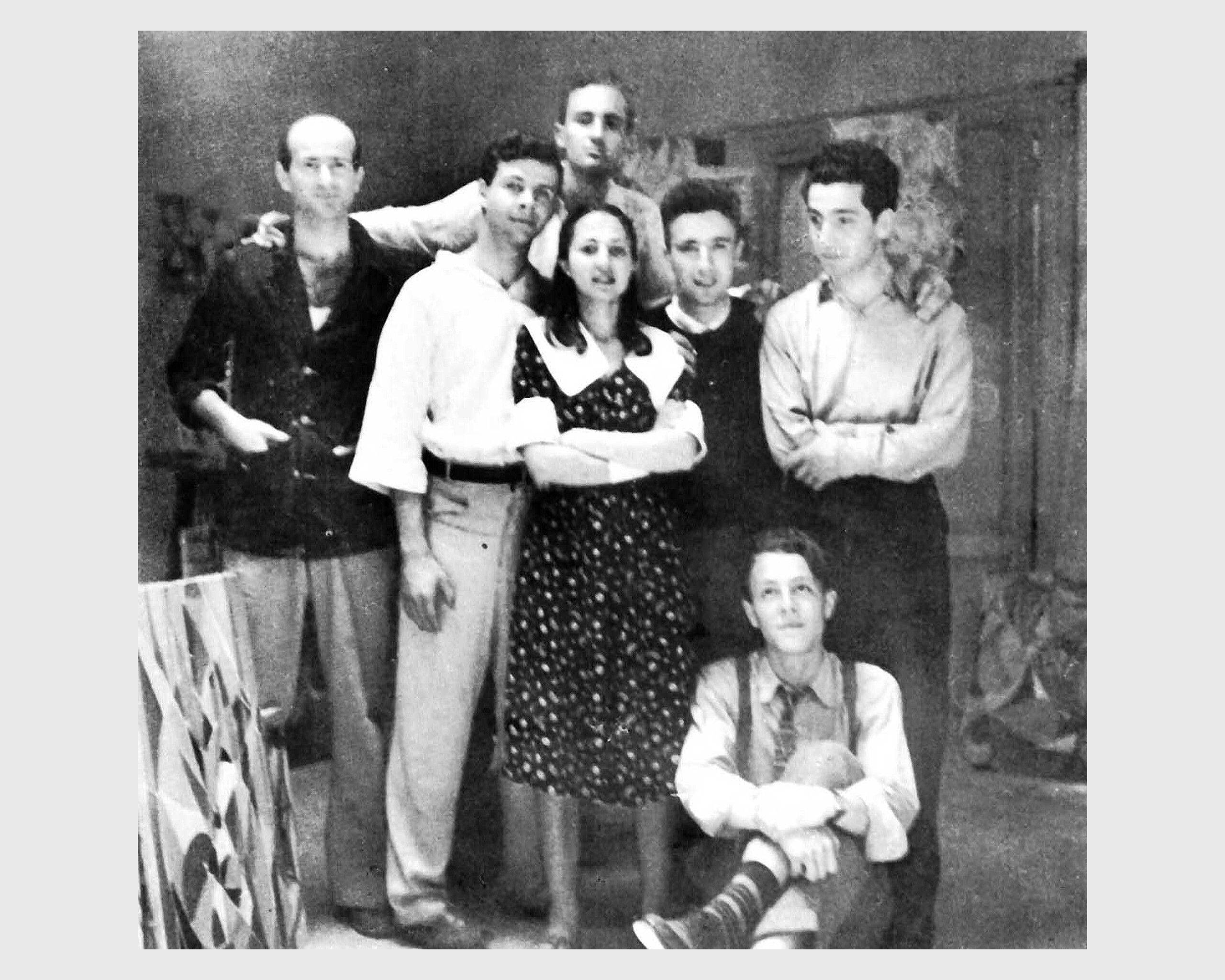 A photo of Forma 1 artists Pietro Consagra, Mino Guerrini, Ugo Attardi, Carla Accardi, Achille Perilli, Antonio Sanfilippo, Giulio Turcato, and Piero Dorazio (sitting below), dated 1947
