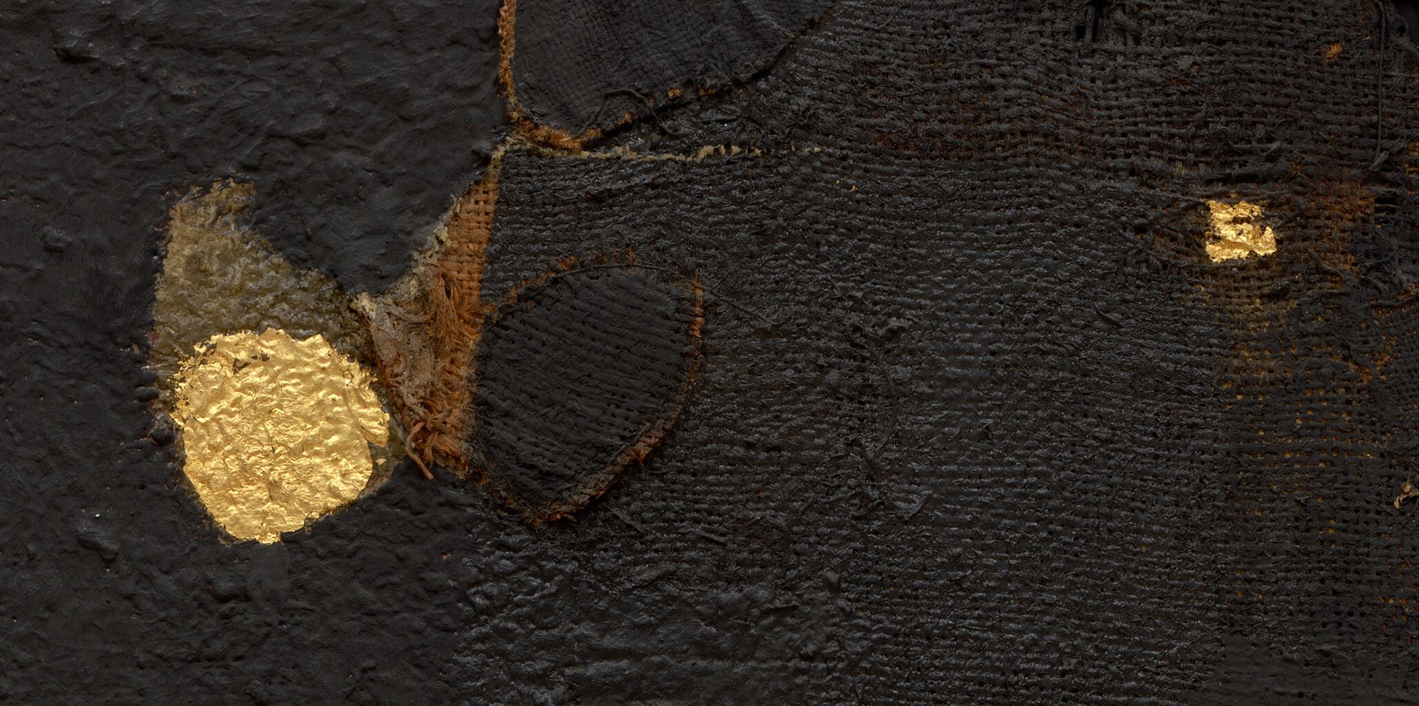 A detail of a work by Alberto Burri, titled "Sacco e oro," dated 1953