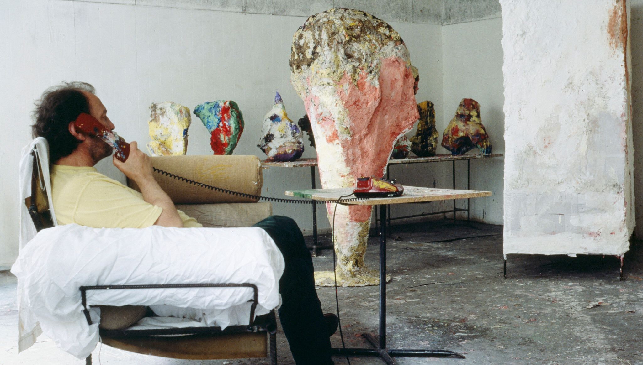 A photo of Franz West in his studio, Vienna, dated 1995