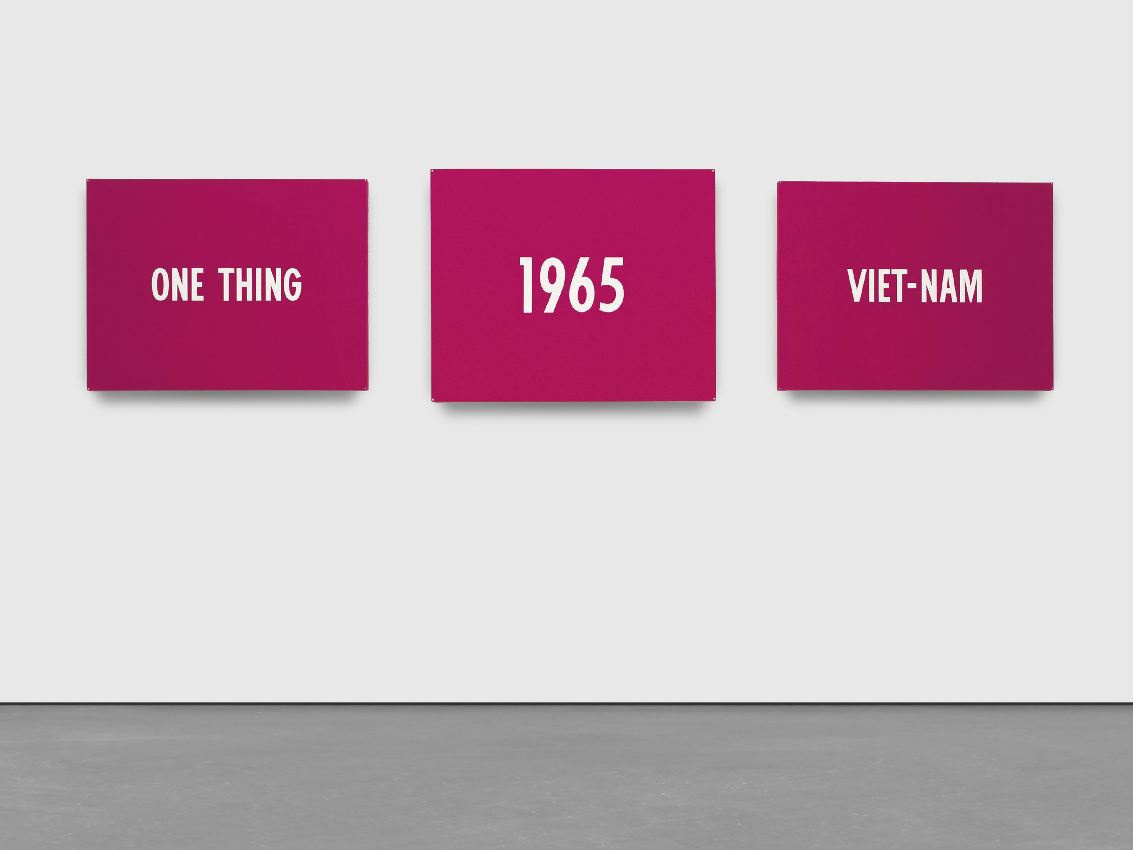 An installation view of three paintings by On Kawara, titled title, dated 1965.