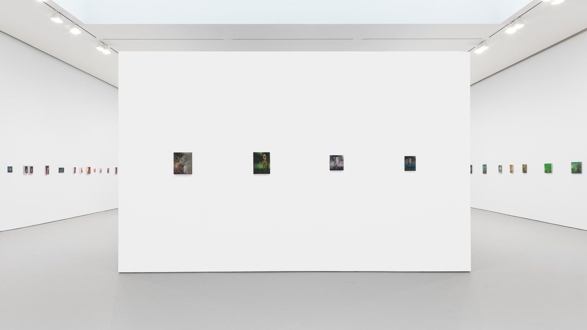 An installation view featuring paintings by Lisa Yuskavage, dated 2018