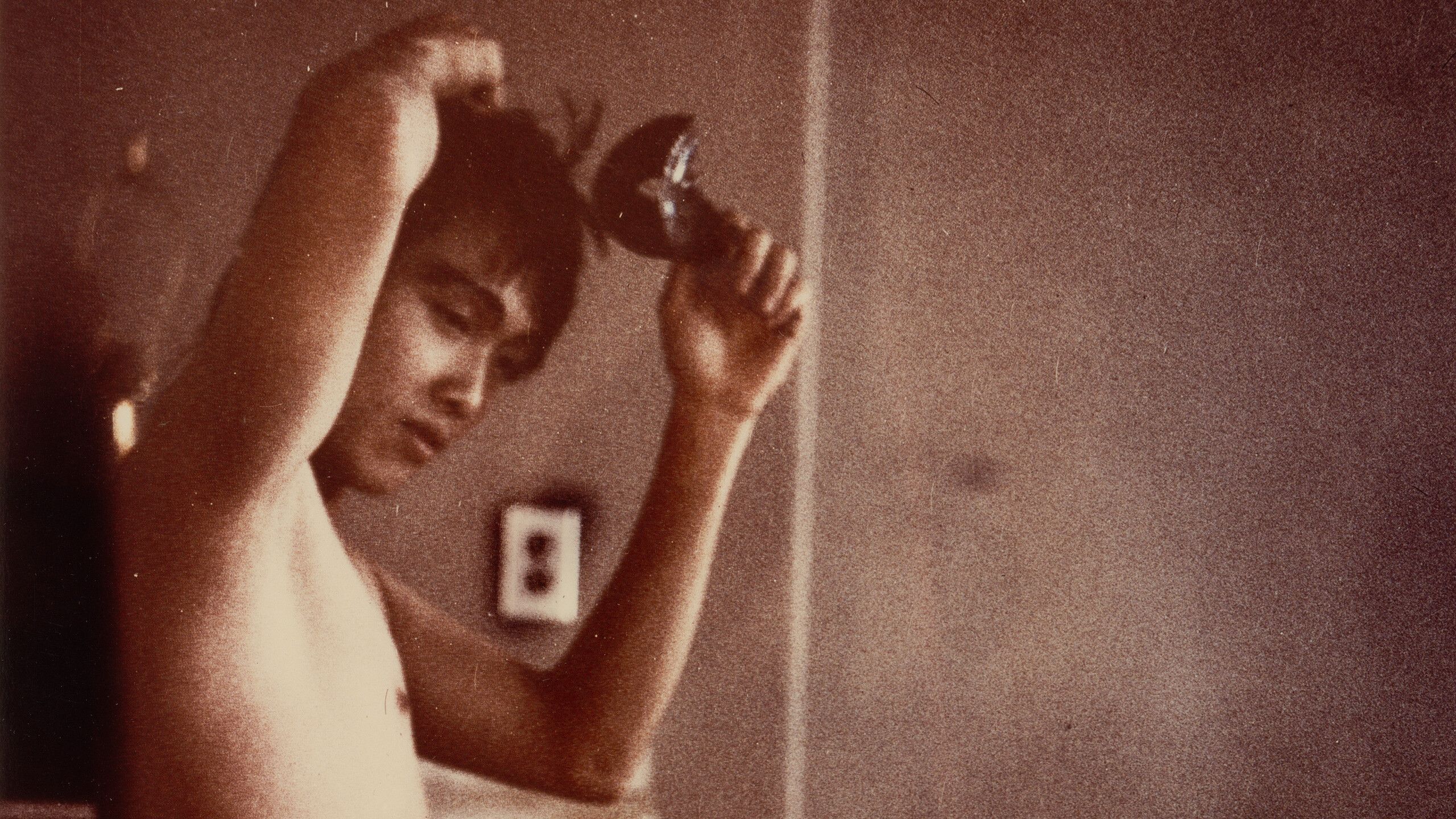 A detail of a photograph by Mark Morrisroe, titled Untitled (Kato), dated 1983.