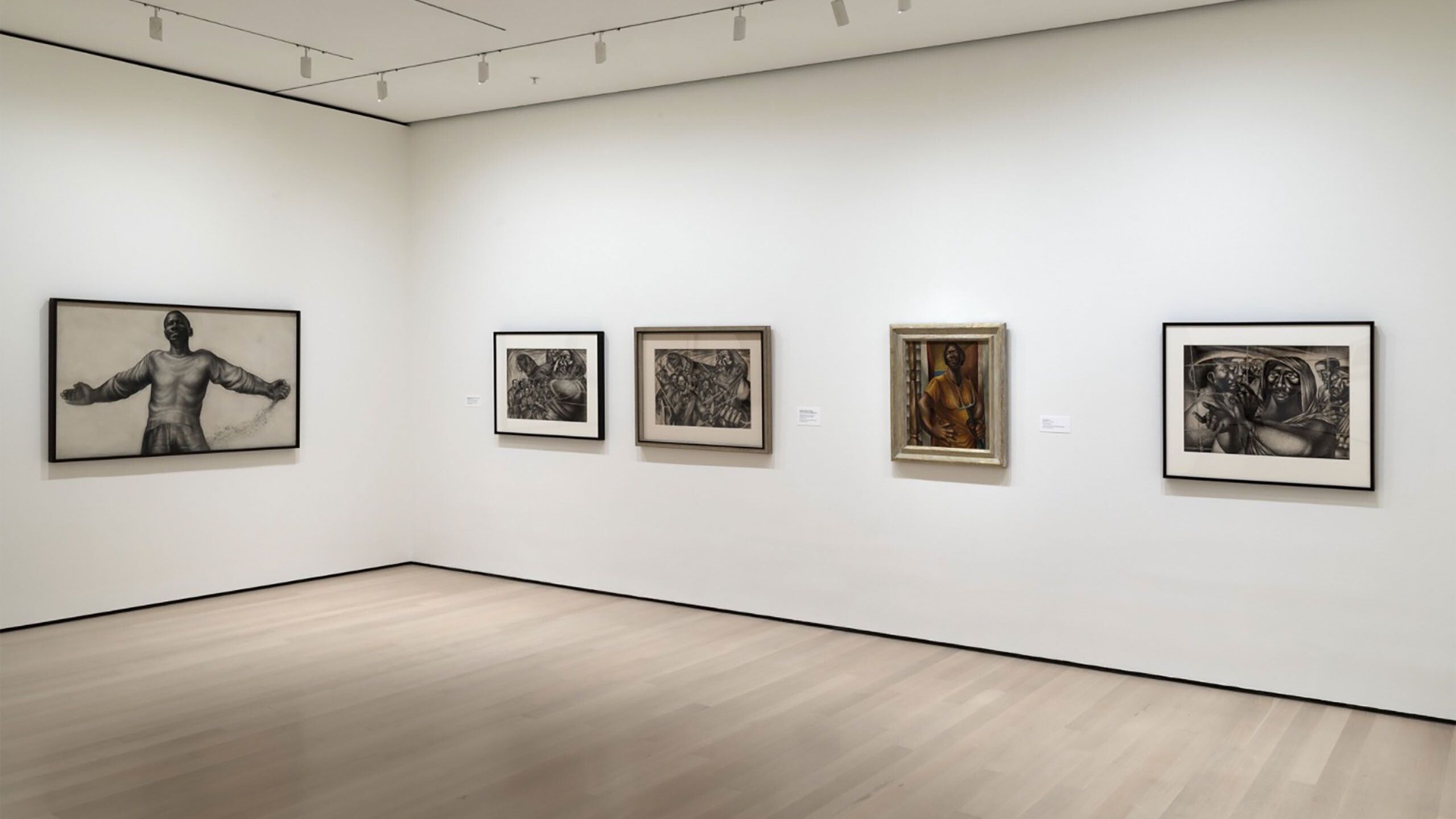 This is an installation view of an exhibition named Charles White: A Retrospective at Museum of Modern Art, New York, 2018