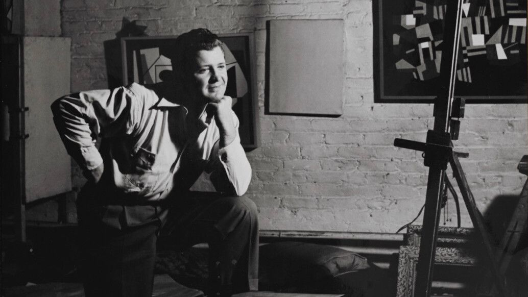 Ad Reinhardt in his studio