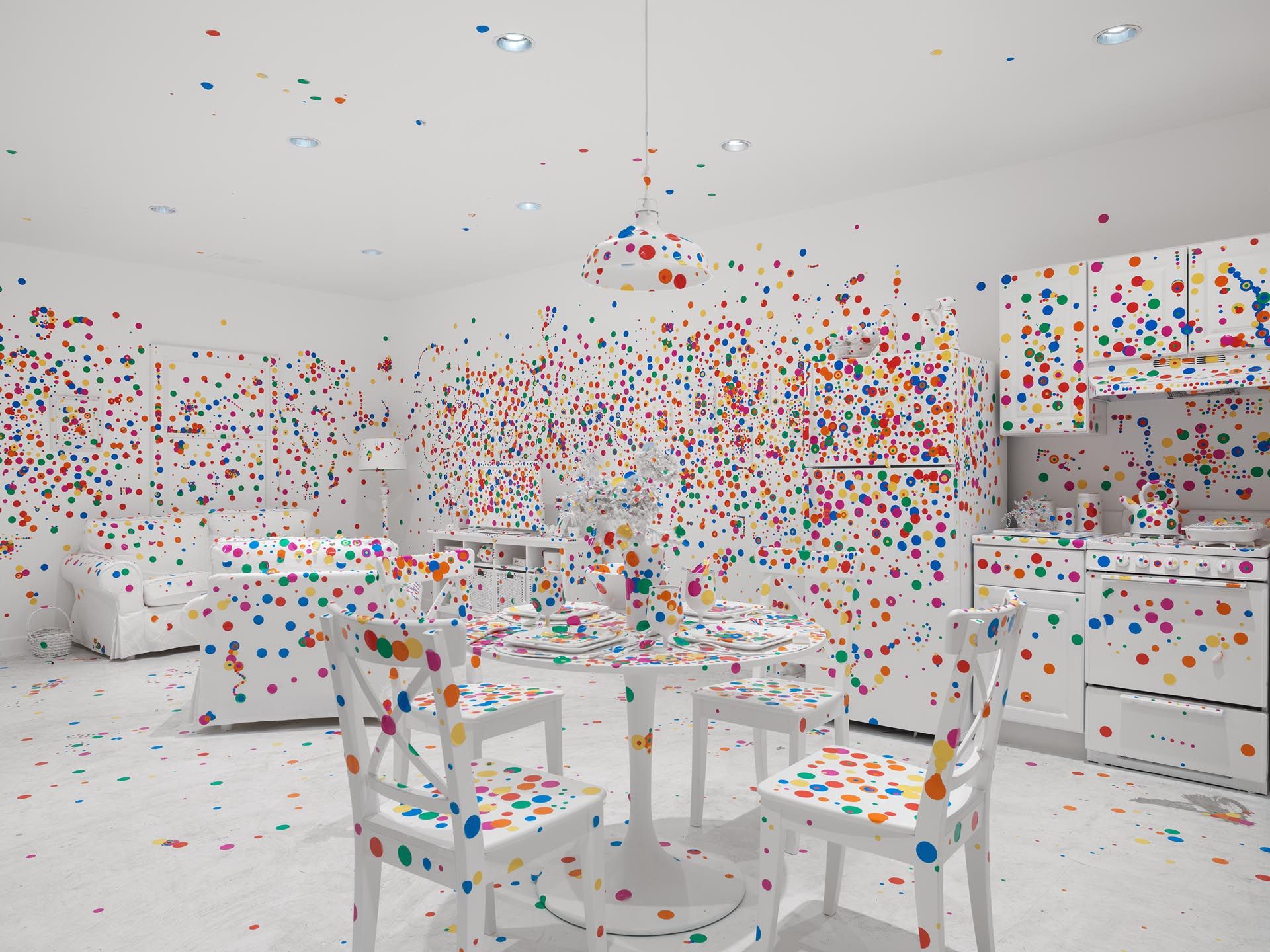 A mixed media installation by Yayoi Kusama titled The Obliteration Room, dated 2002 to present.