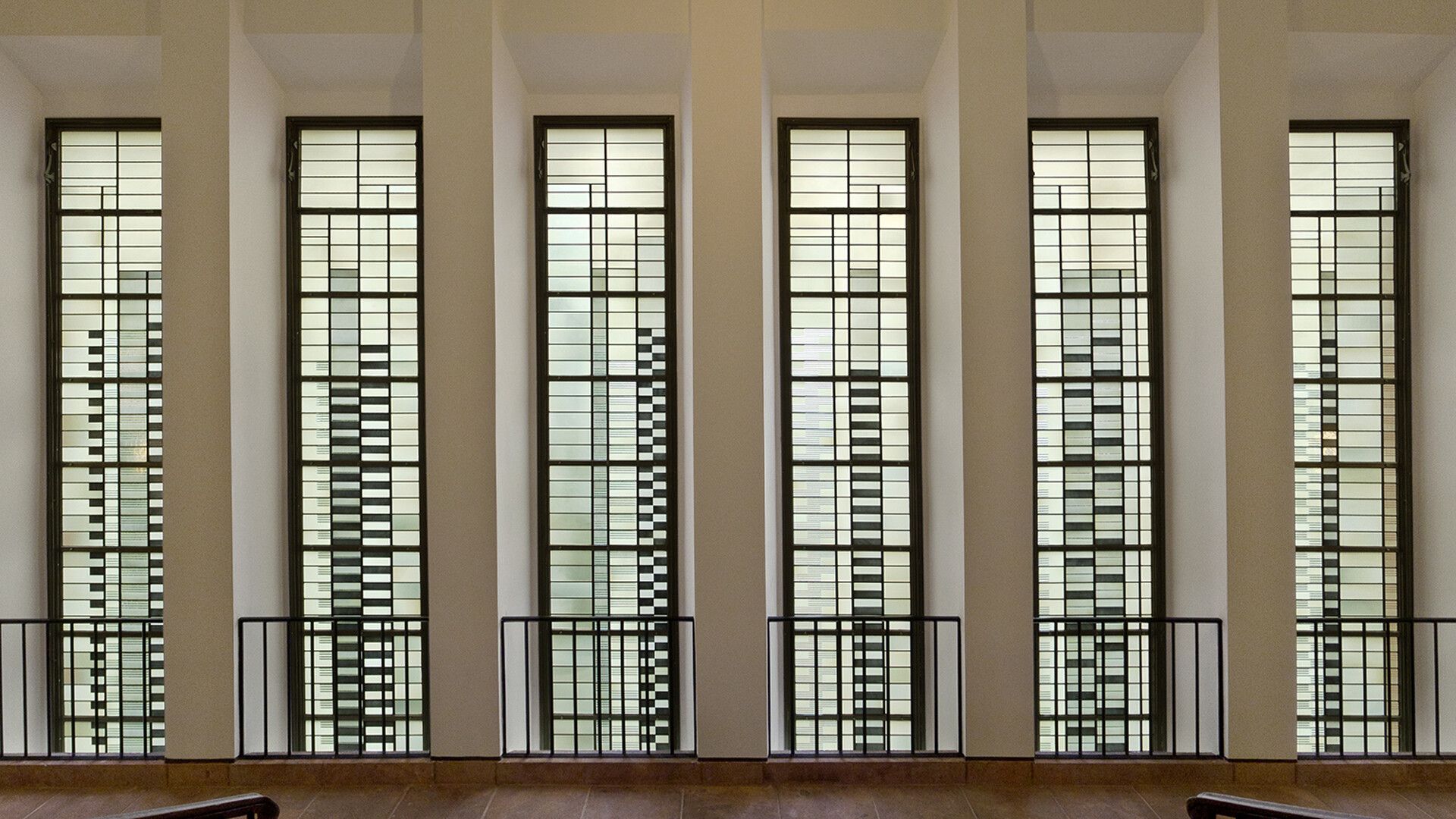A photo of Stained glass windows designed by Josef Albers for the Sommerfeld Residence, dated c. 1920–1921.