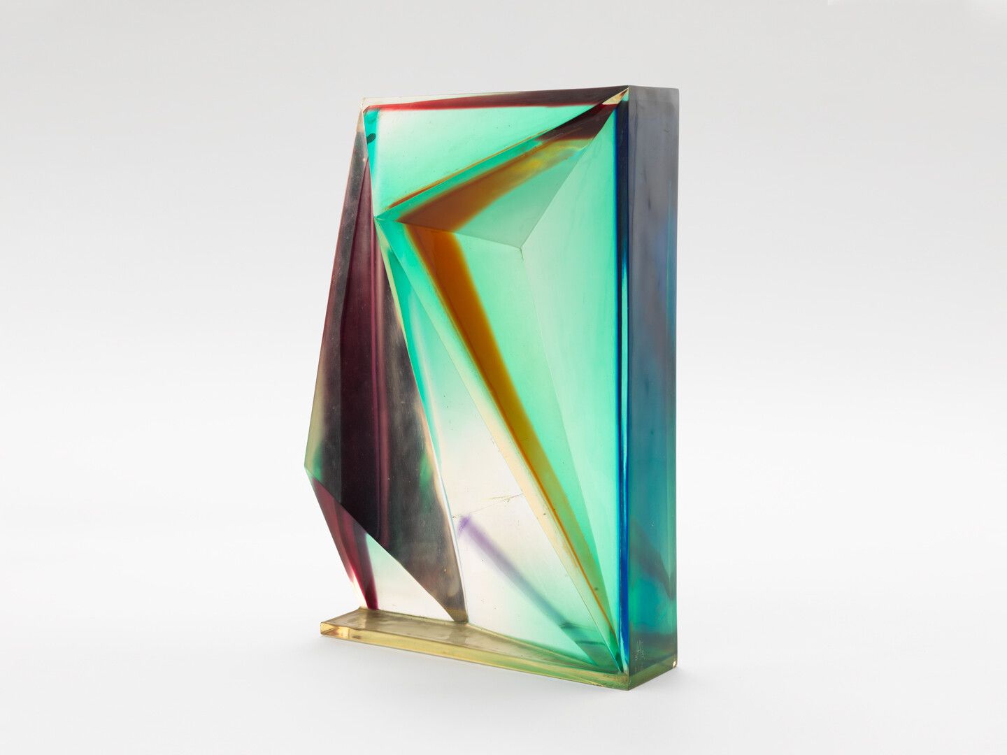 A polyester resin sculpture by Leo Amino, titled, Refractional #106 (Rectangular Female), dated 1975. 