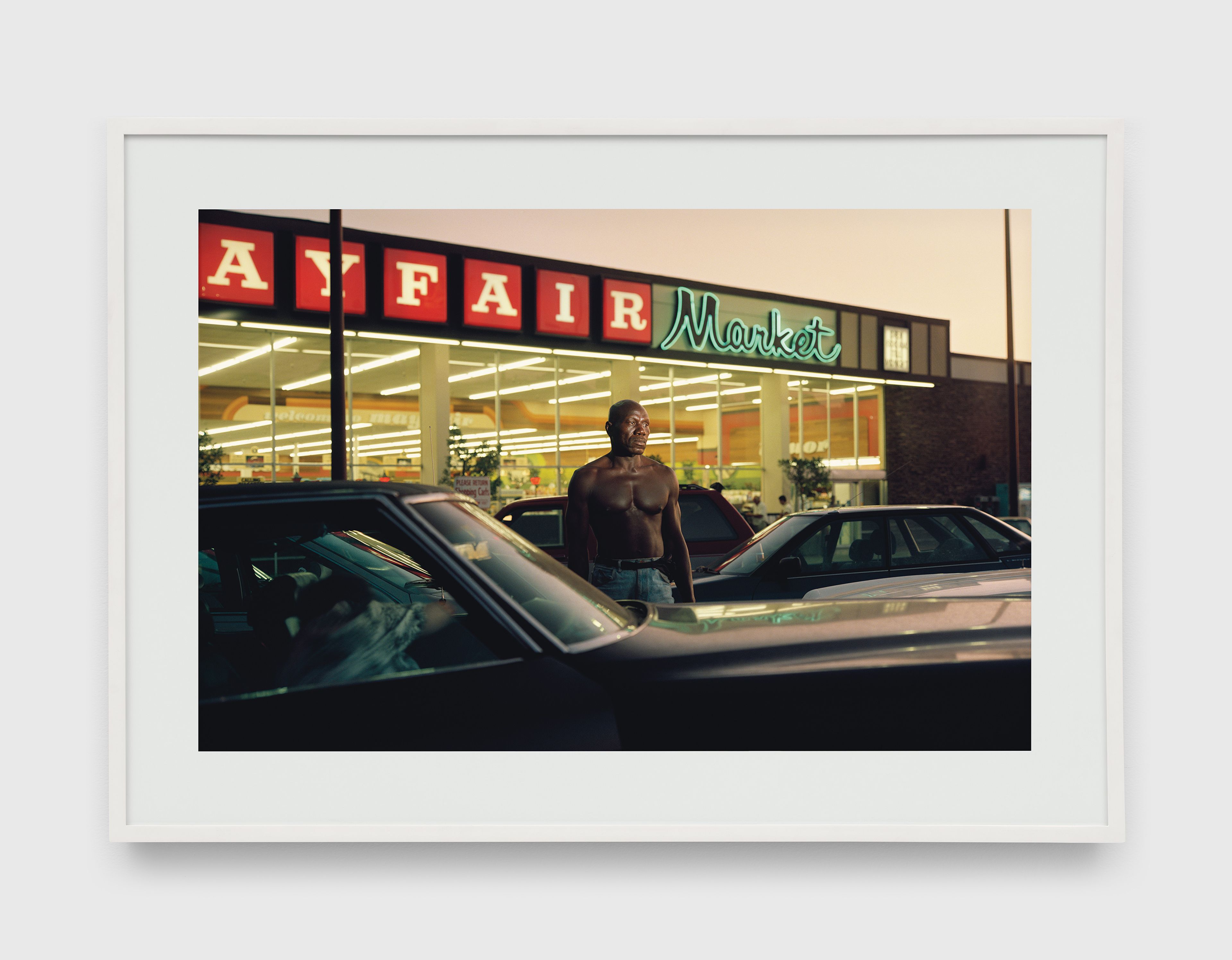 A photograph by Philip-Lorca diCorcia, titled Ike Cole, 38 years old, Los Angeles, California, 25 dollars, dated 1990 to 1992.