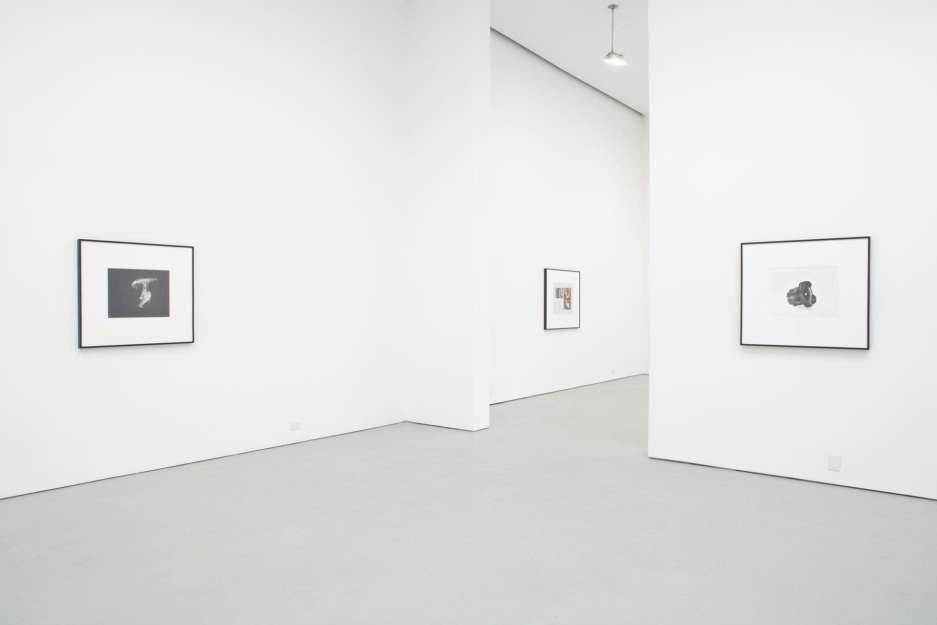 Installation view of the exhibition Christopher Williams: For Example: Dix-Huit Leçons Sur La Société Industrielle (Revision 4), at David Zwirner in New York, dated 2006.