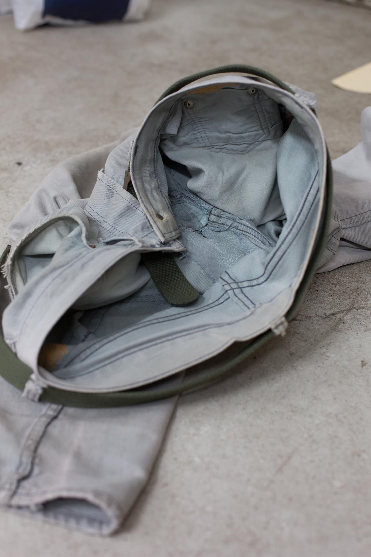 A photograph by Wolfgang Tillmans, titled grey jeans, inside, dated 2012.