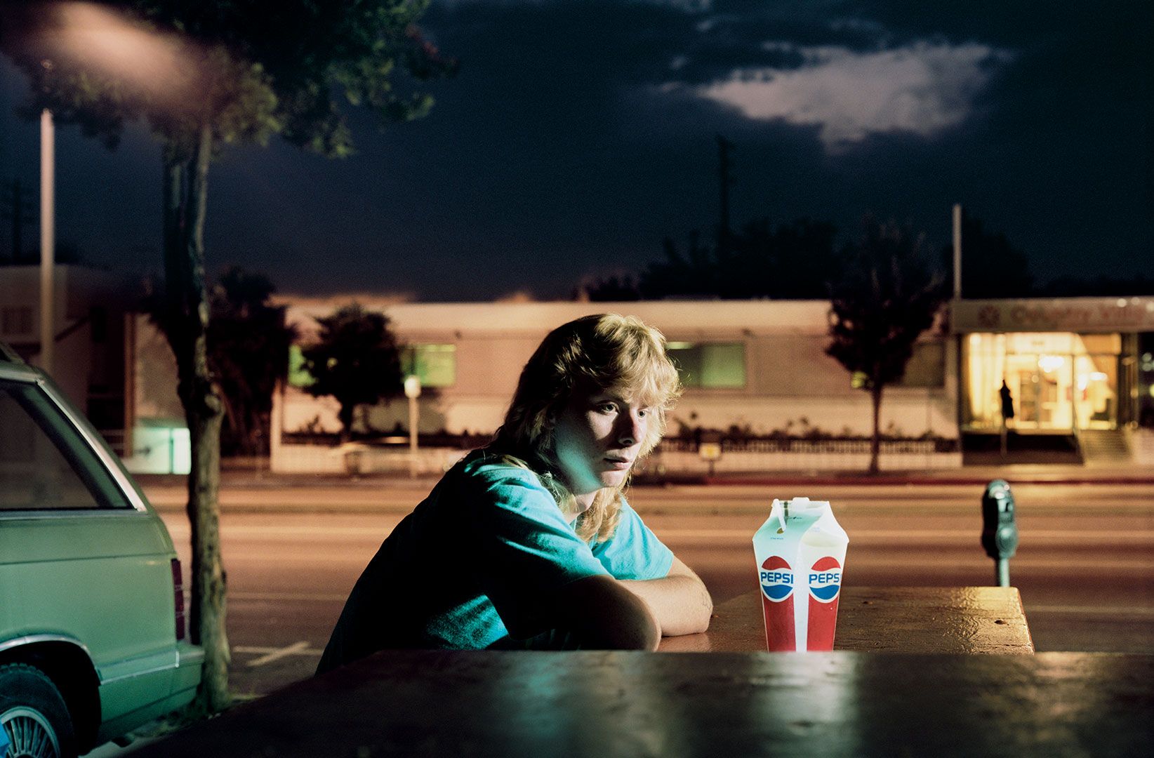 A photograph by Philip-Lorca diCorcia titled Brent Booth, 21 years old, Des Moines, Iowa, $30, dated 1990 to 1992.