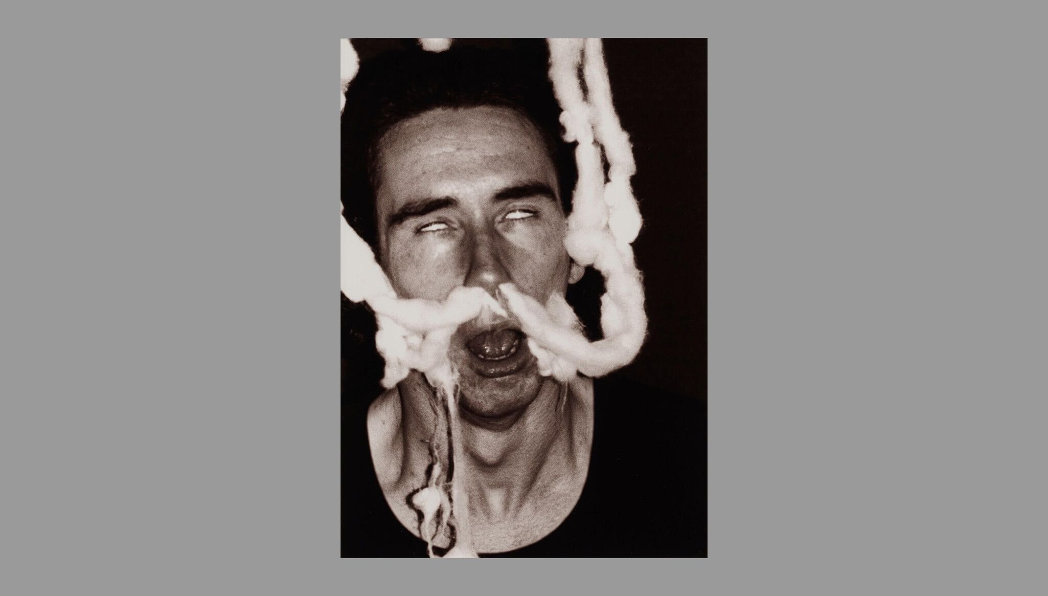 A detail of a photograph by Mike Kelley, titled Ectoplasm Photographs, dated 1978