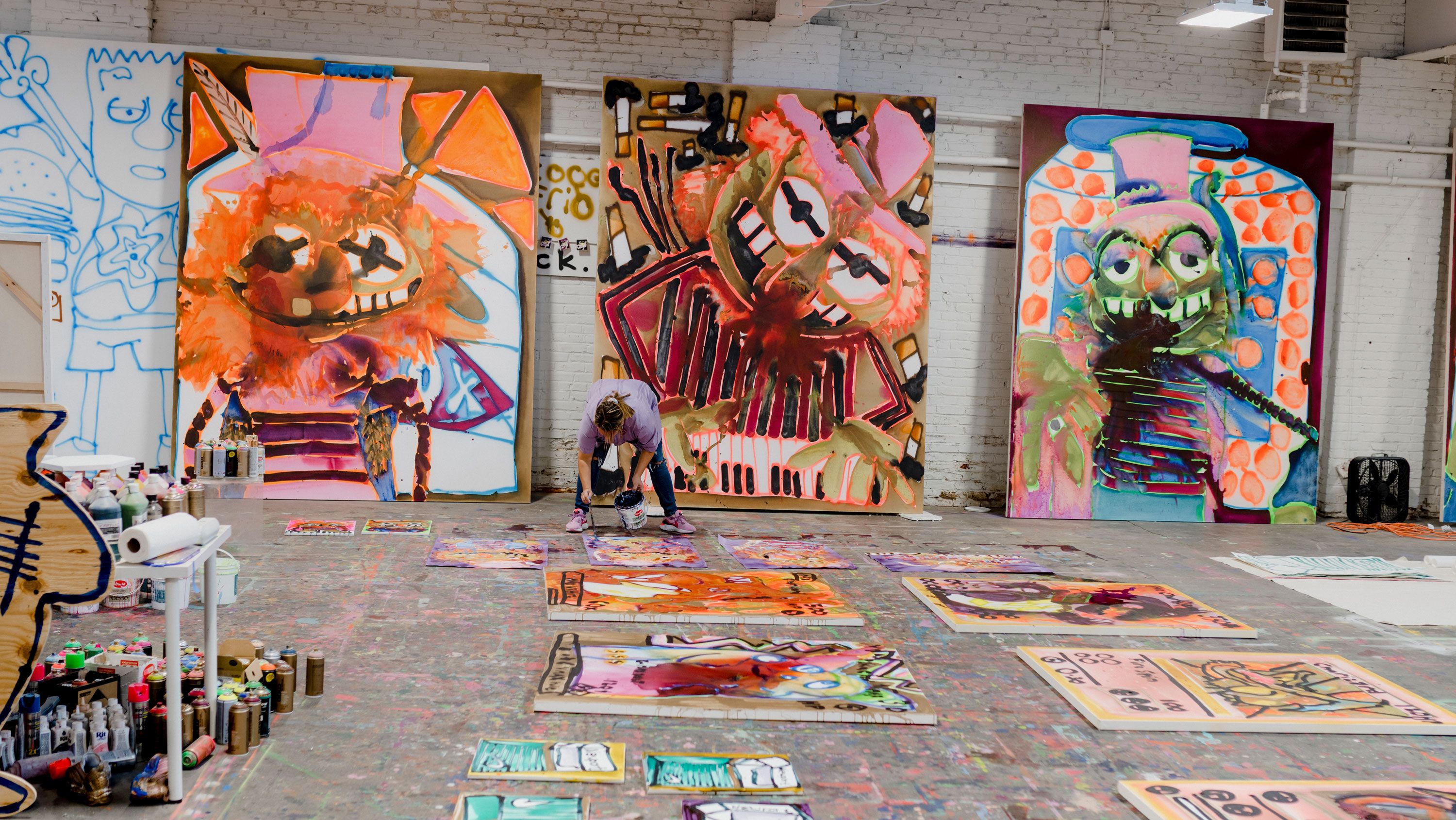 Paintings regularly line the walls and dry across the floor, filling every space in Bernhardt’s studio.