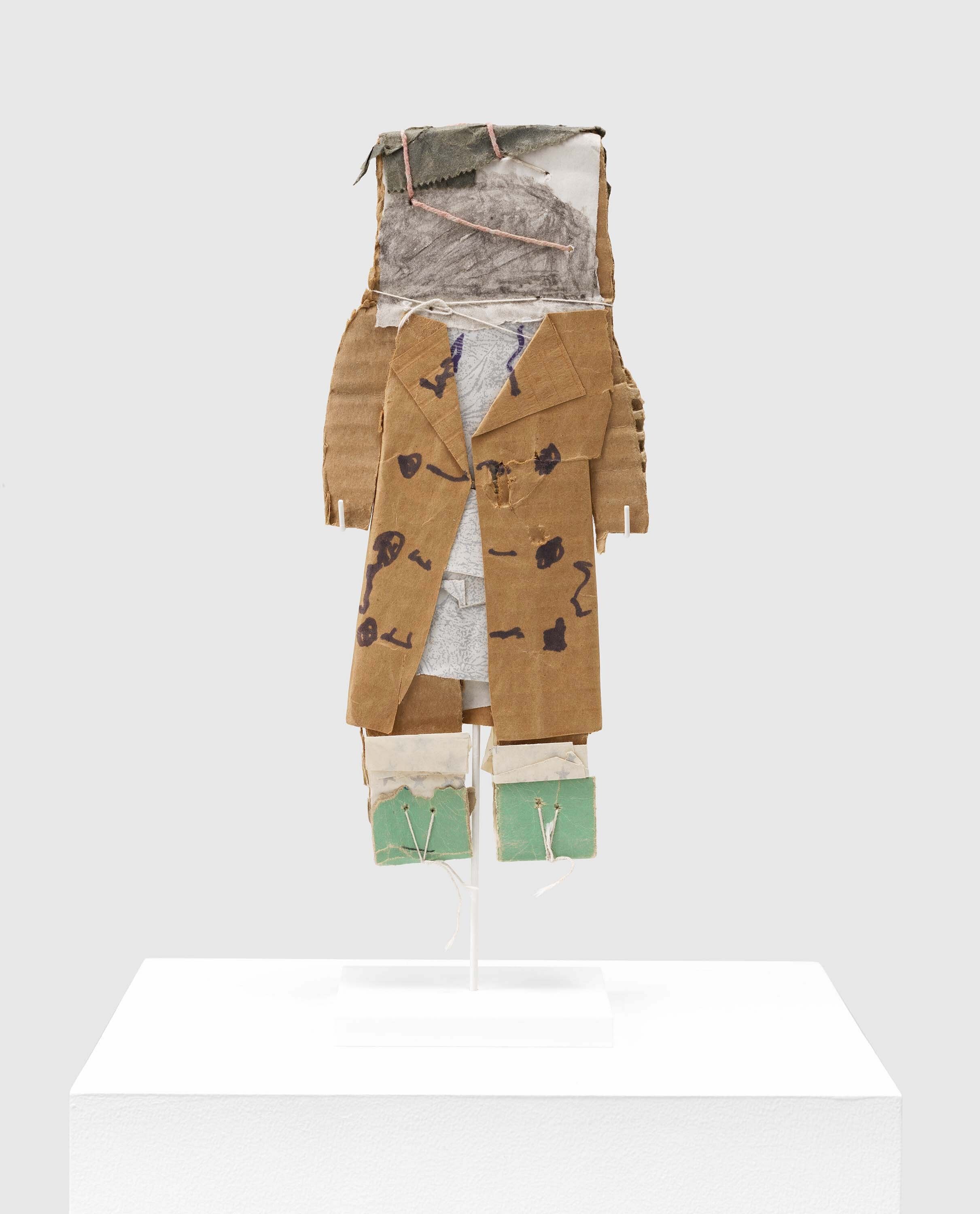 A soot, ink, and string on found paper artwork by James Castle, called Untitled (figure, red coat), n.d.