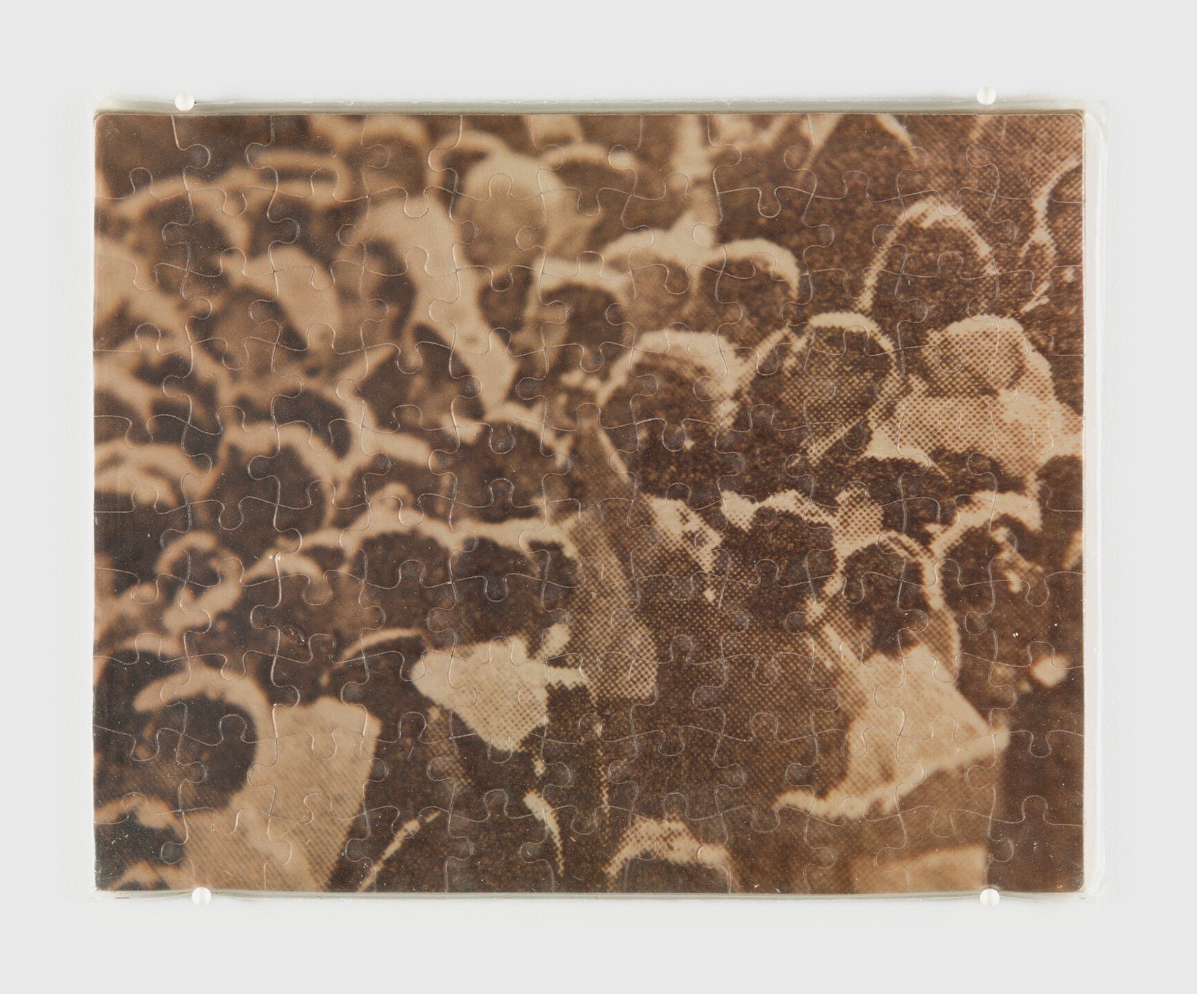 A c-print jigsaw puzzle in plastic bag by Felix Gonzalez-Torres, titled "Untitled", dated 1987.