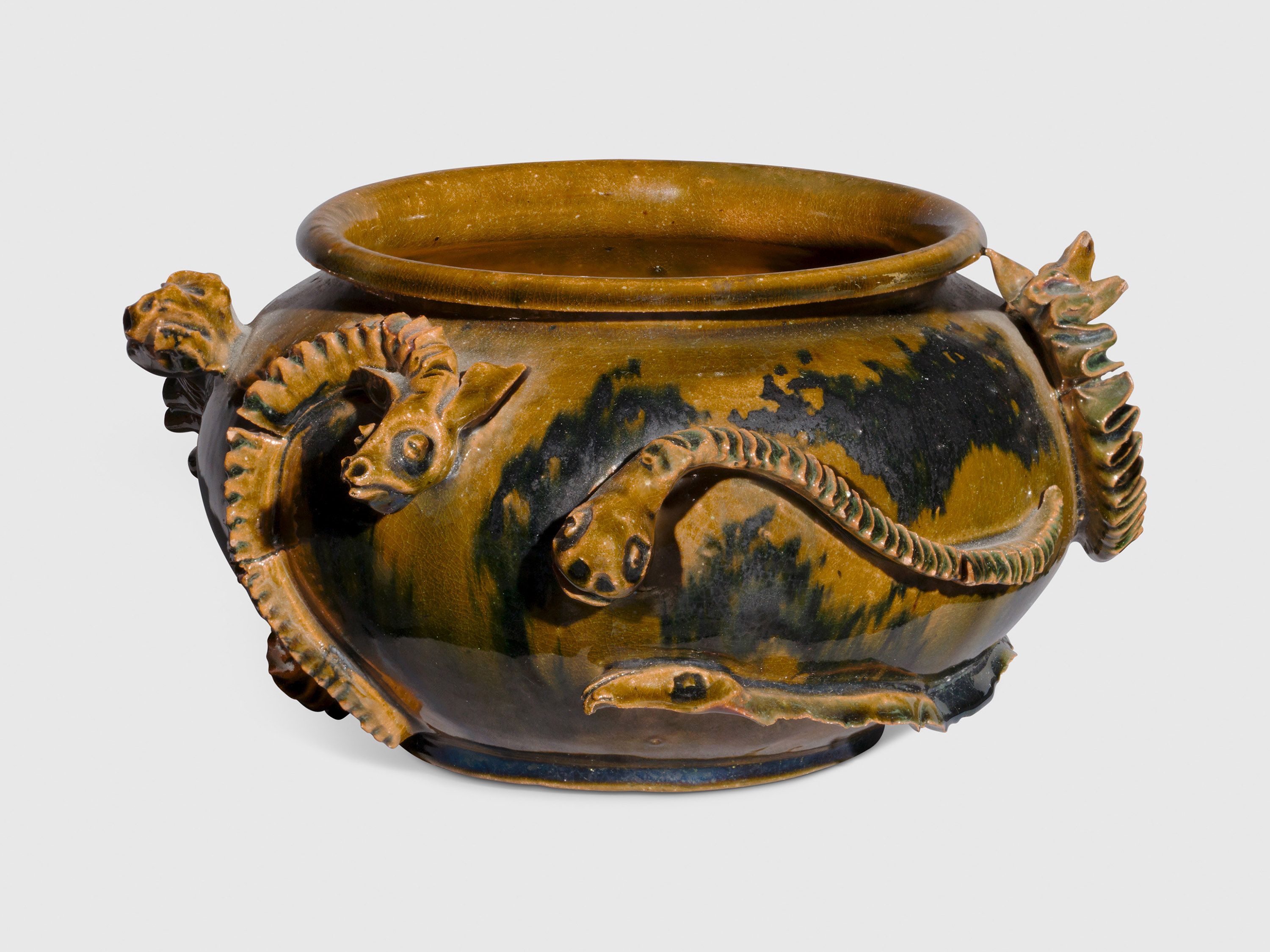 A sculpture by George Ohr, titled Vase with seven snakes, dated 1895 to 1896.