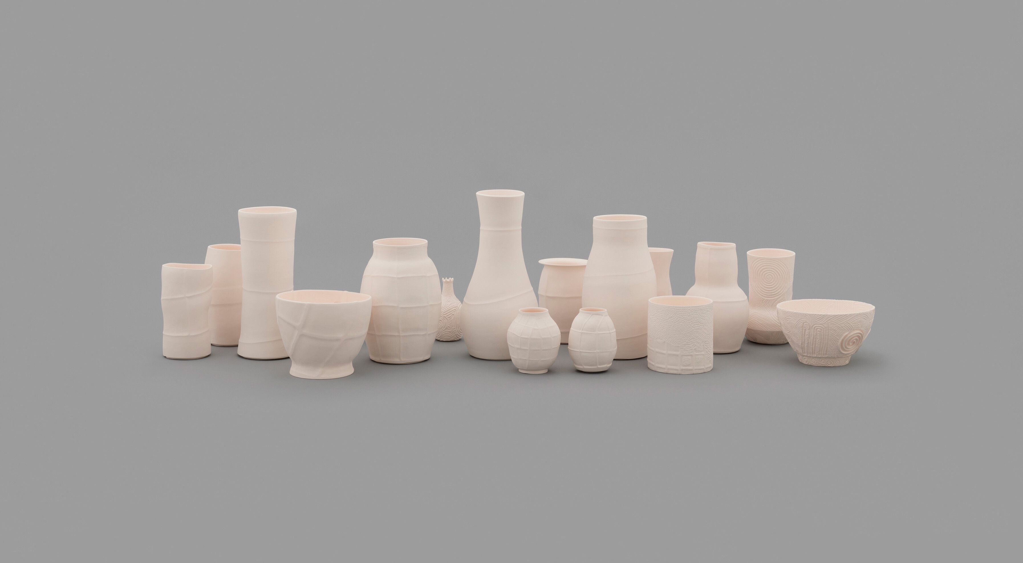 A eighteen part porcelain artwork by Shio Kusaka, titled (map 1), dated 2021.