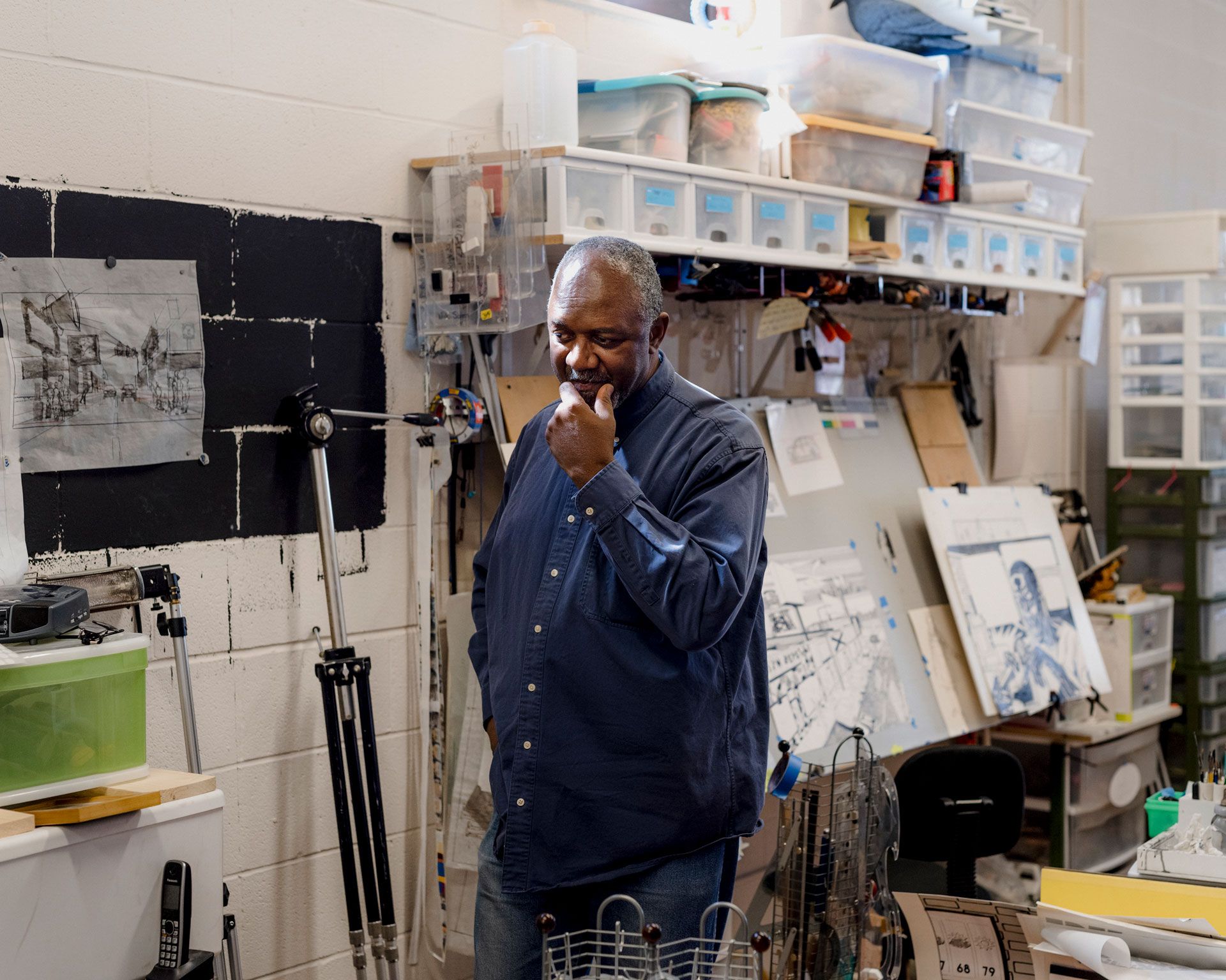 A photograph of Kerry James Marshall in his studio, dated 2016
