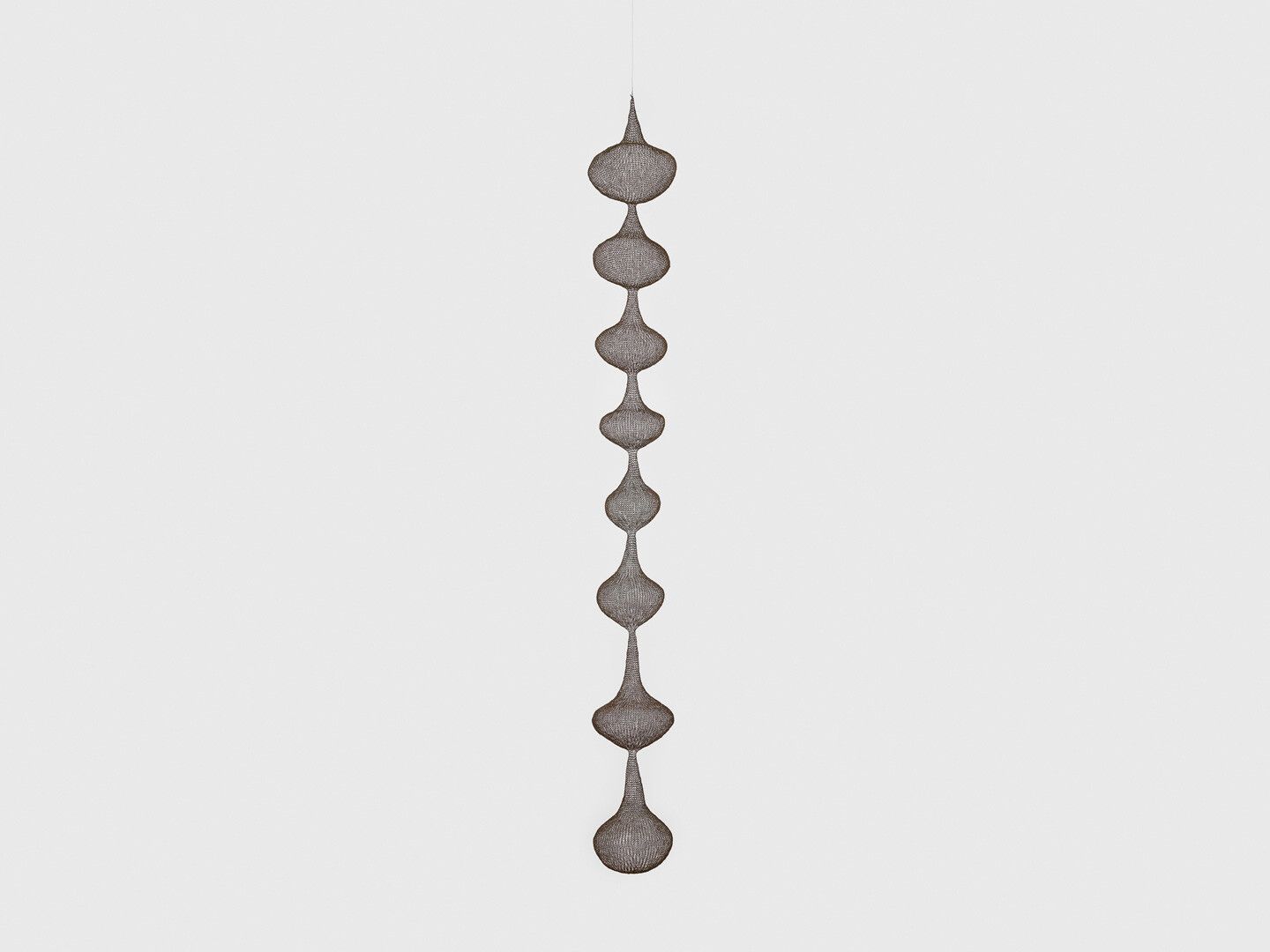 A hanging iron wire sculpture by Ruth Asawa, titled Untitled (S.435, Hanging Eight-Lobed, Single-Layered Continuous Tear-Drop Form)e, dated 1952.