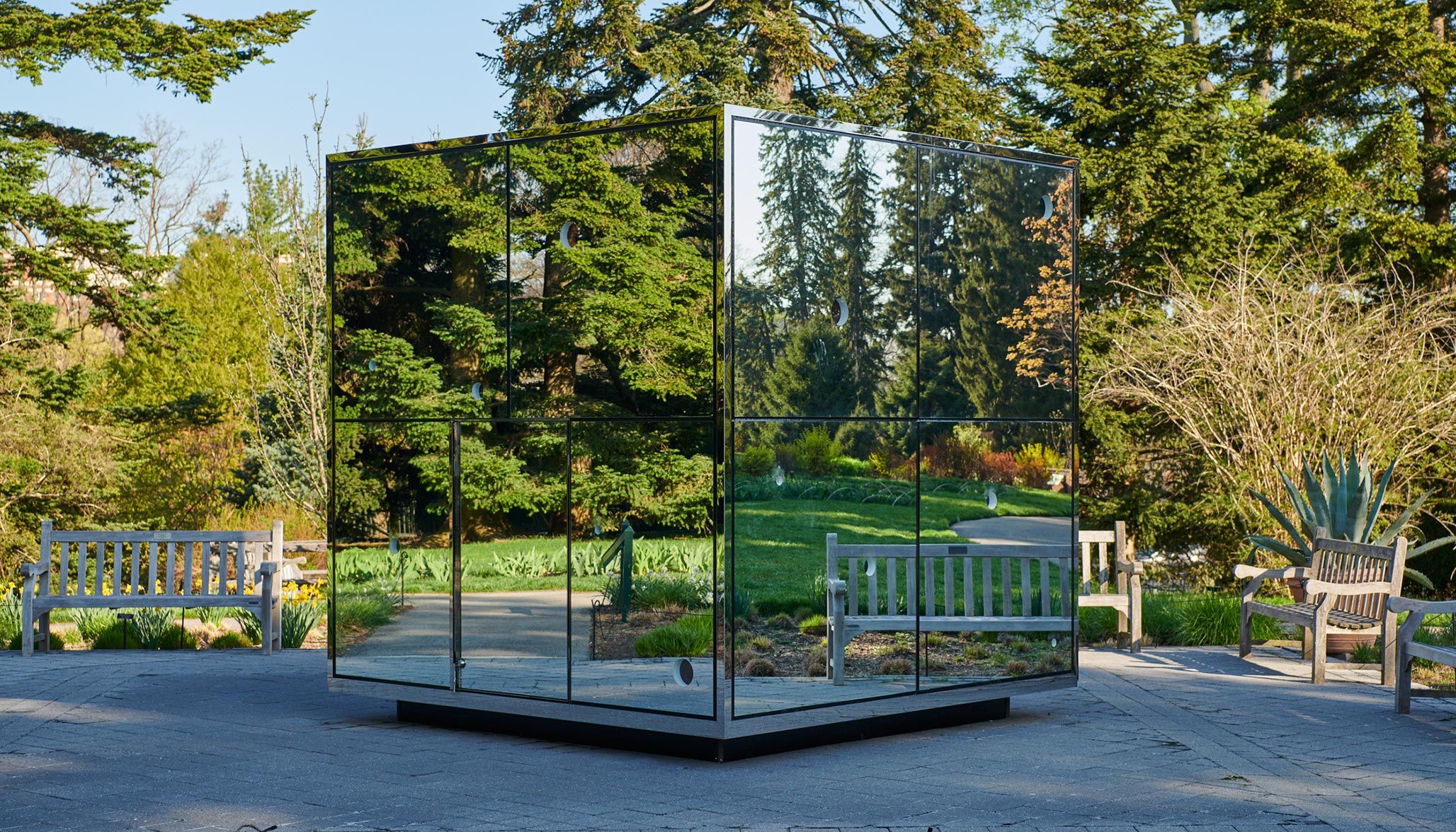 An installation view of an exhibition titled Kusama: Cosmic Nature at New York Botanical Garden in 2021.