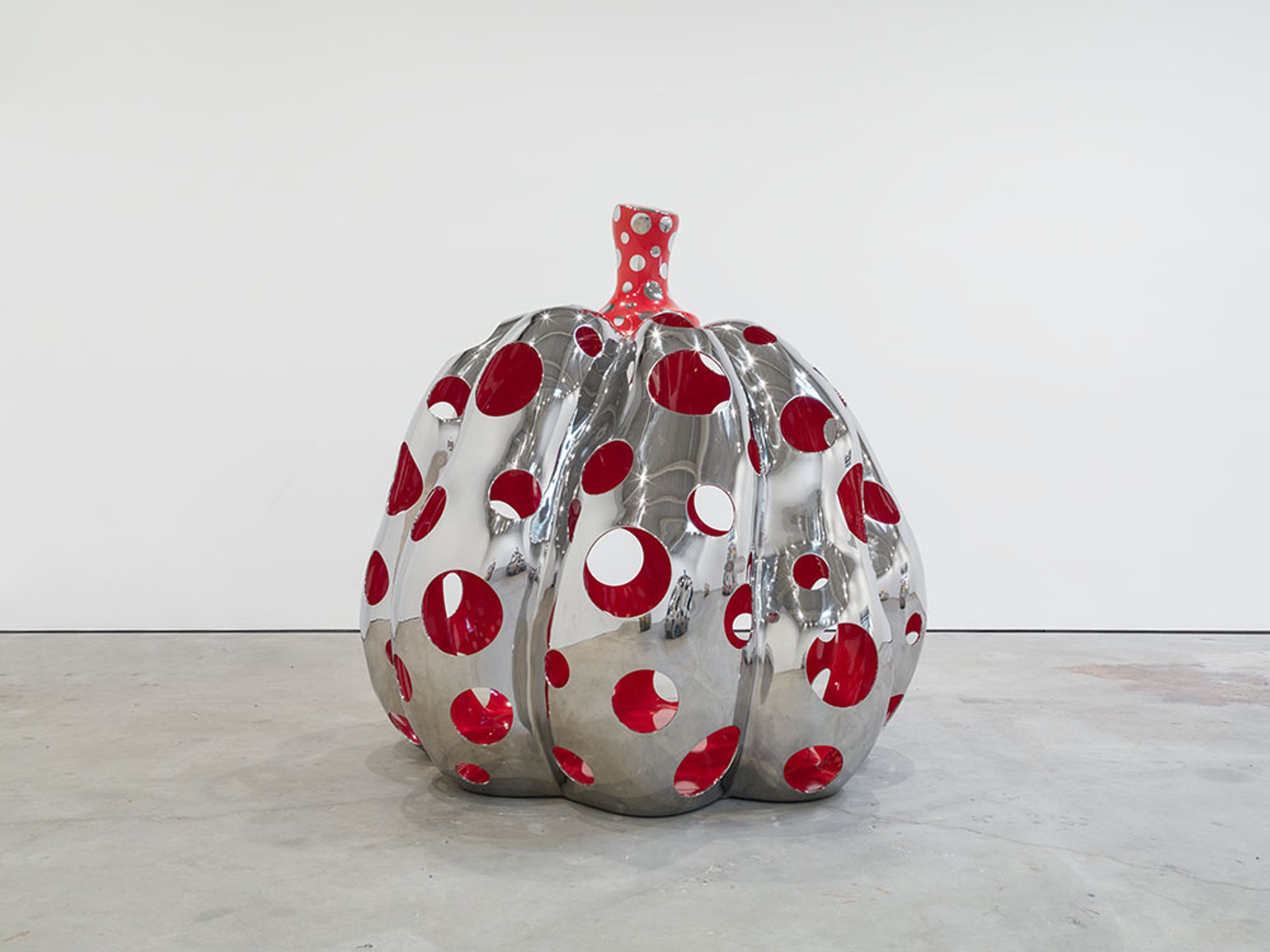 A sculpture by Yayoi Kusama, titled PUMPKIN, dated 2015.