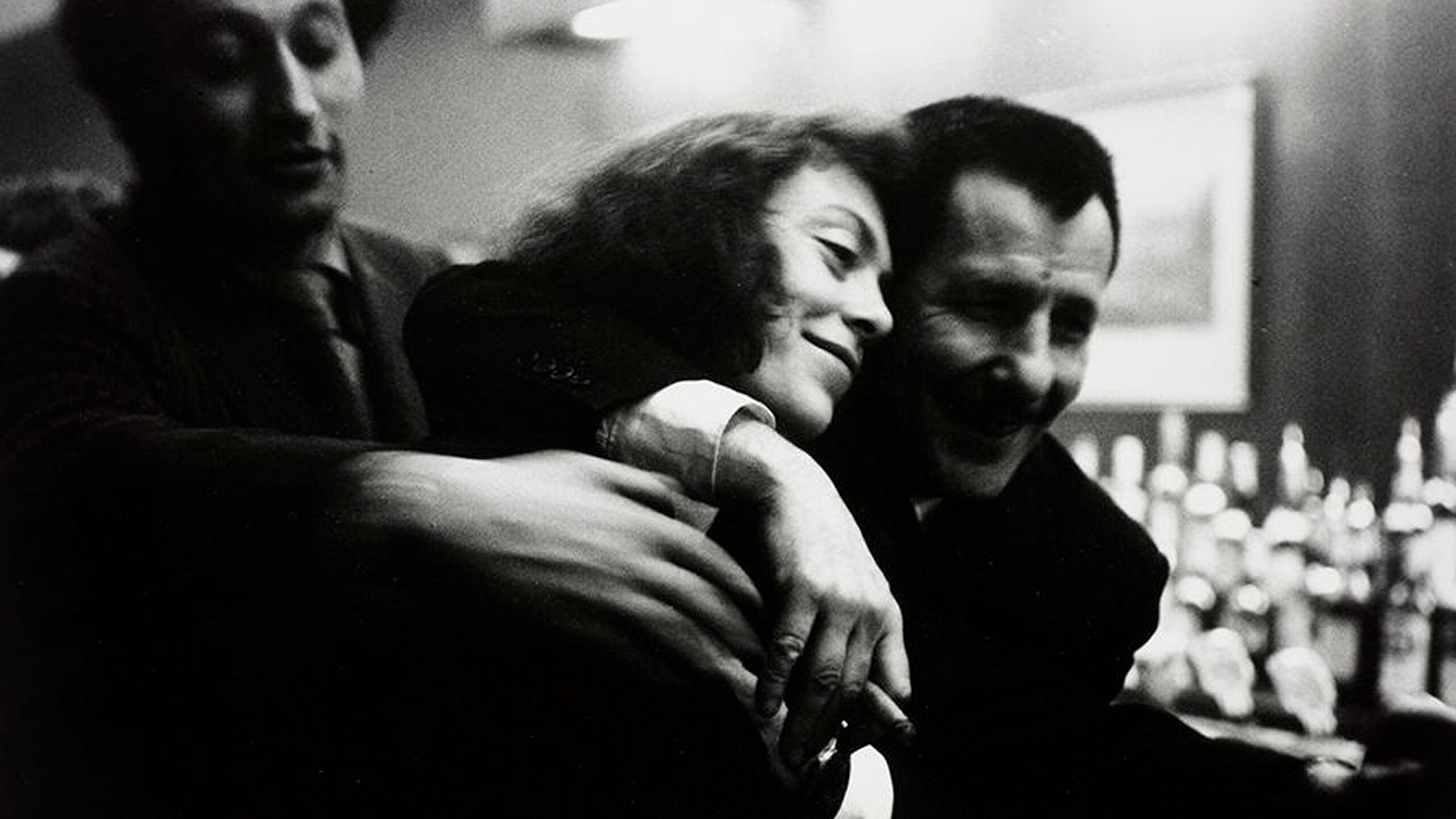 A photo of Norman Bluhm, Joan Mitchell, and Franz Kline at the Cedar Tavern in 1957.