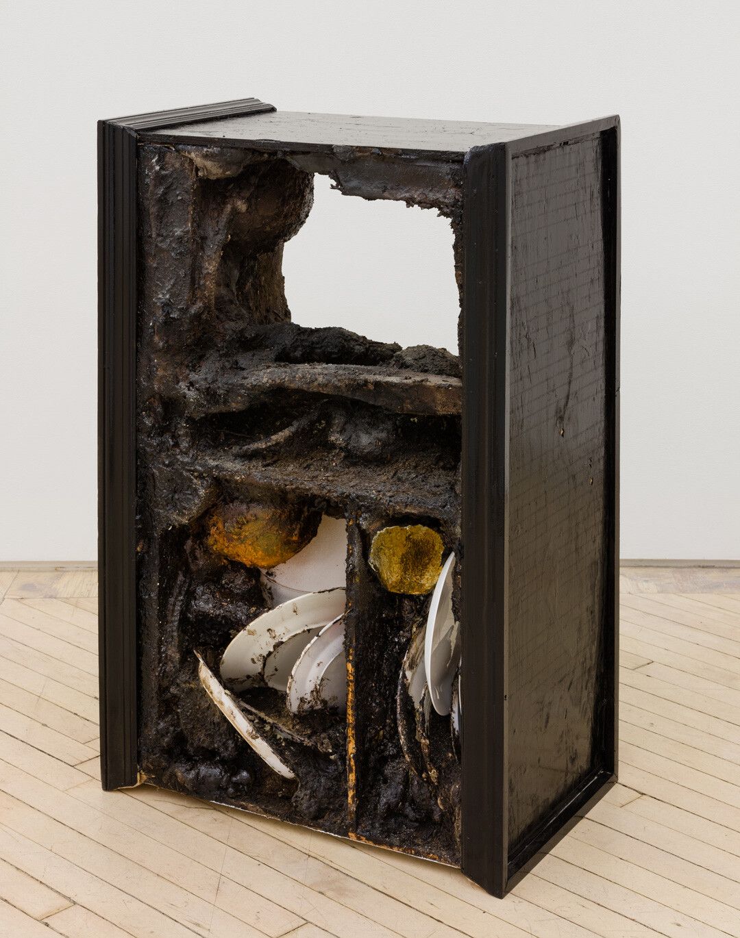 A mixed media sculpture by Brandon Ndife, titled Hygge, dated 2020.