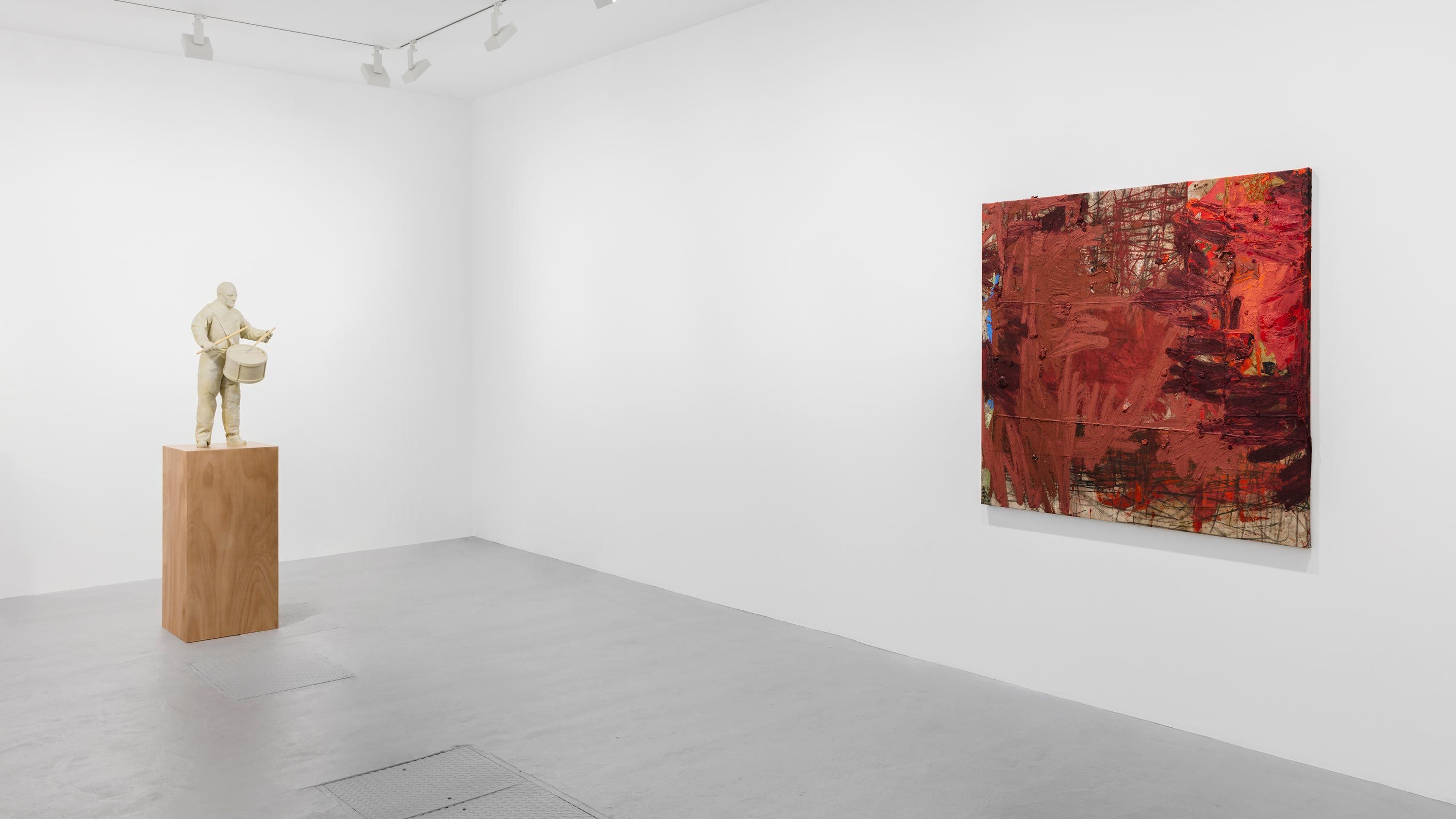 Installation view, Program, David Zwirner, Paris, 2021, featuring works, from left, by Juan Muñoz and Oscar Murillo