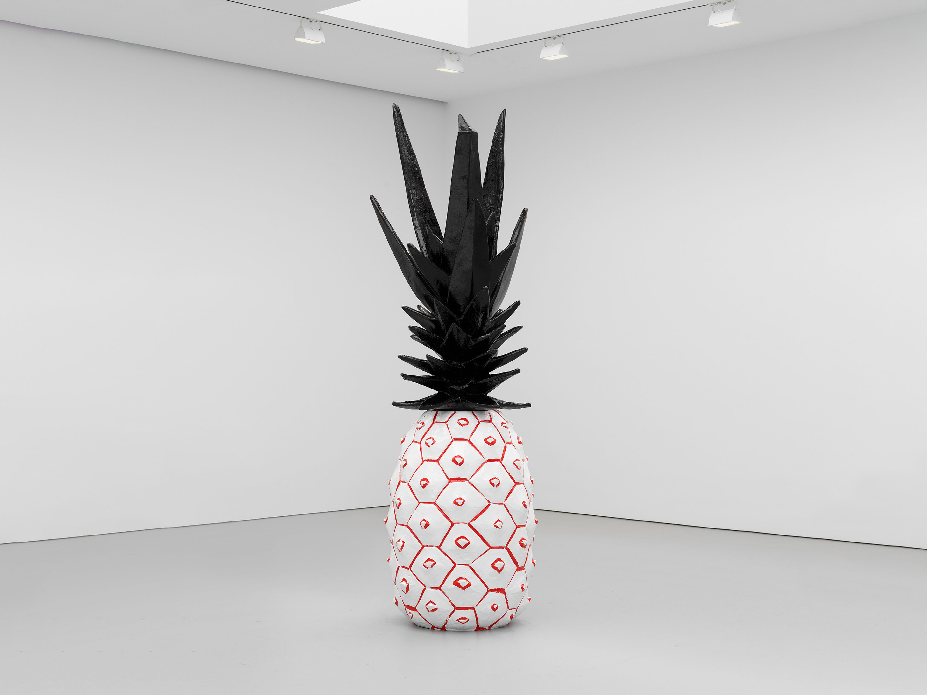 A painted bronze sculpture in two parts by Rose Wylie, titled Pineapple, dated 2020.