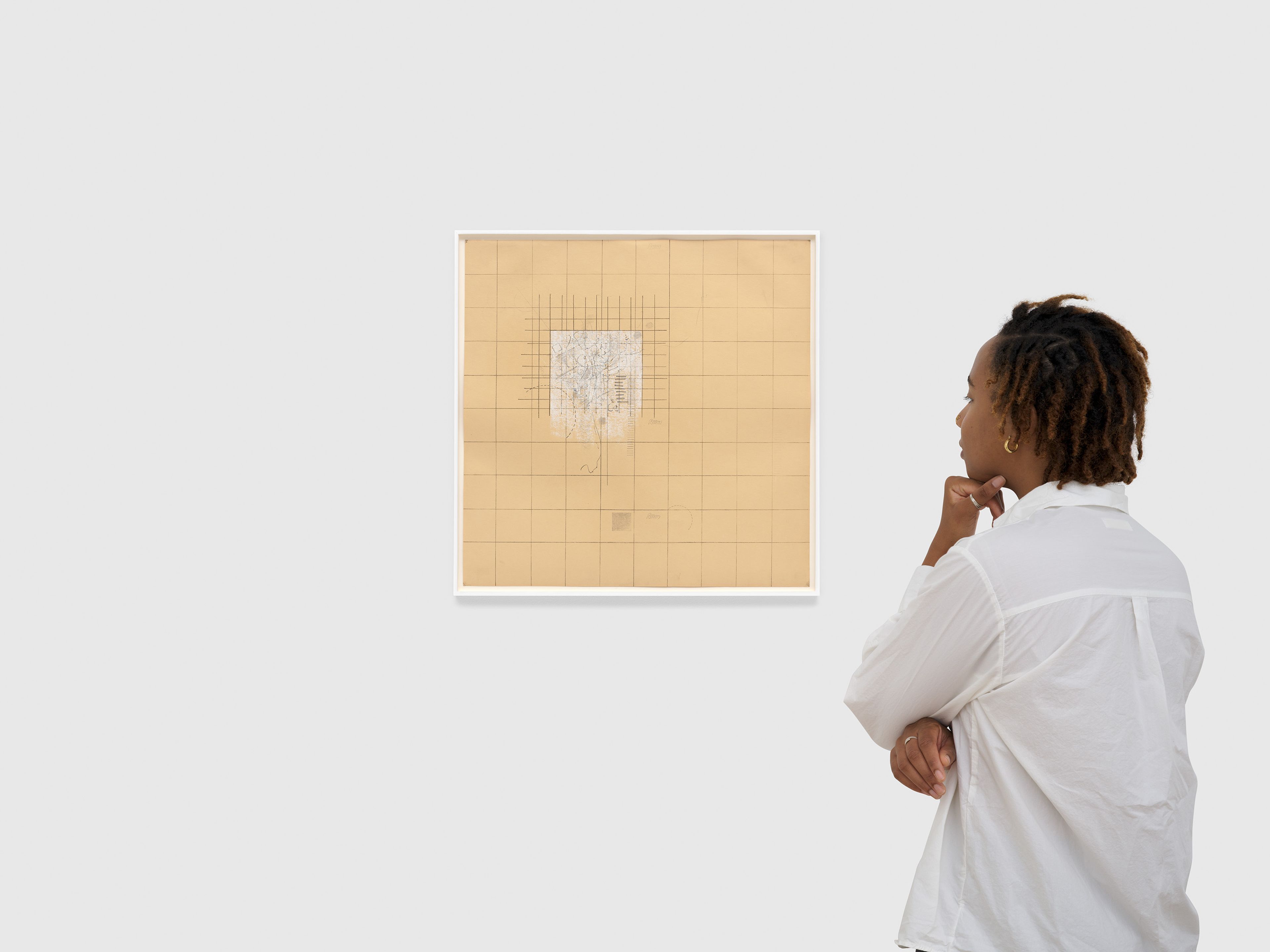 A work on paper by Robert Ryman, titled Yellow Drawing #10, dated 1963.