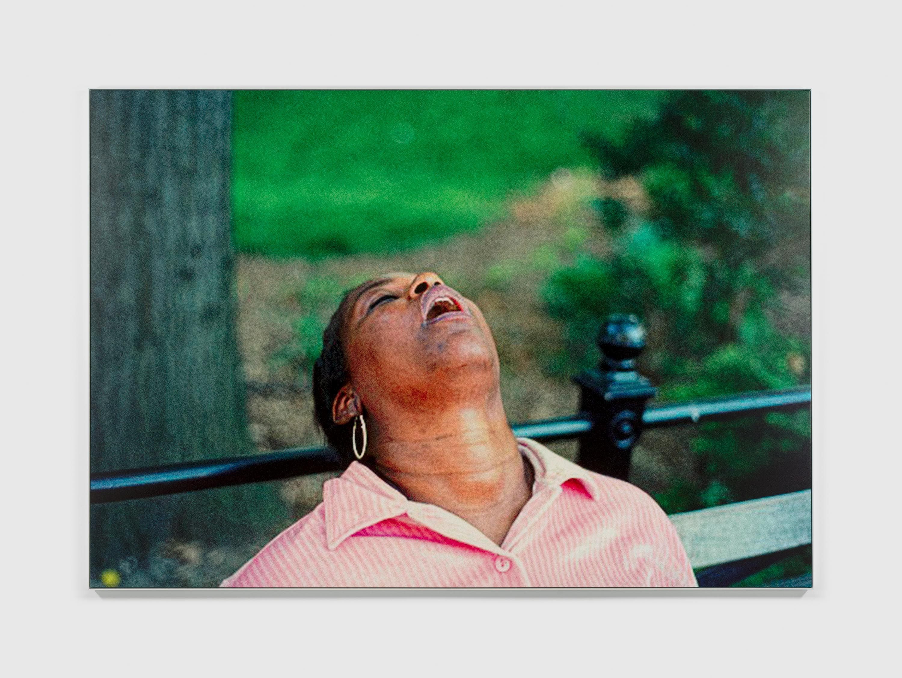 A photograph by Steven Shearer, titled Woman on Bench, dated 2024.