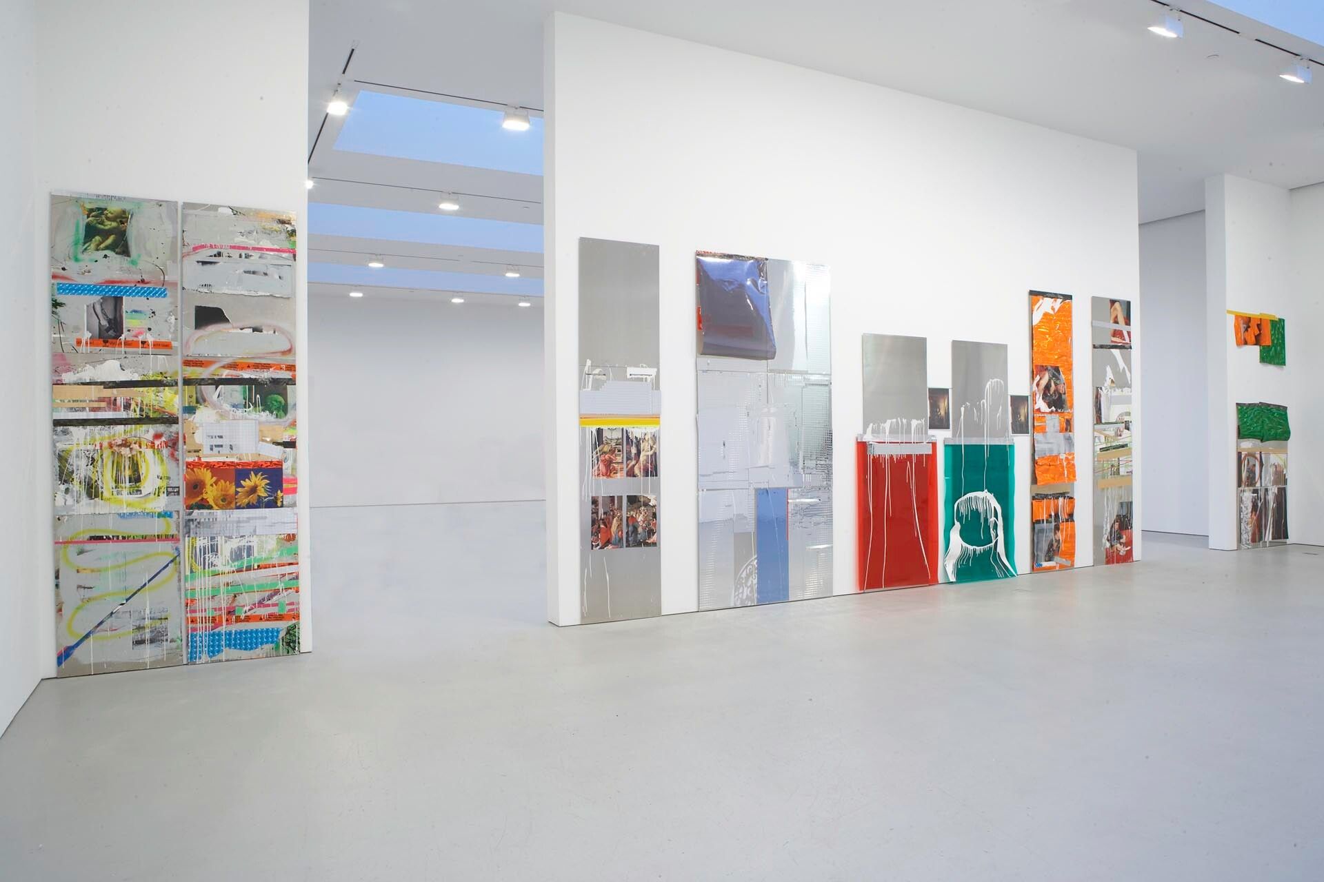An untitled 9 panel wall installation by Isa Genzken, dated 2006.