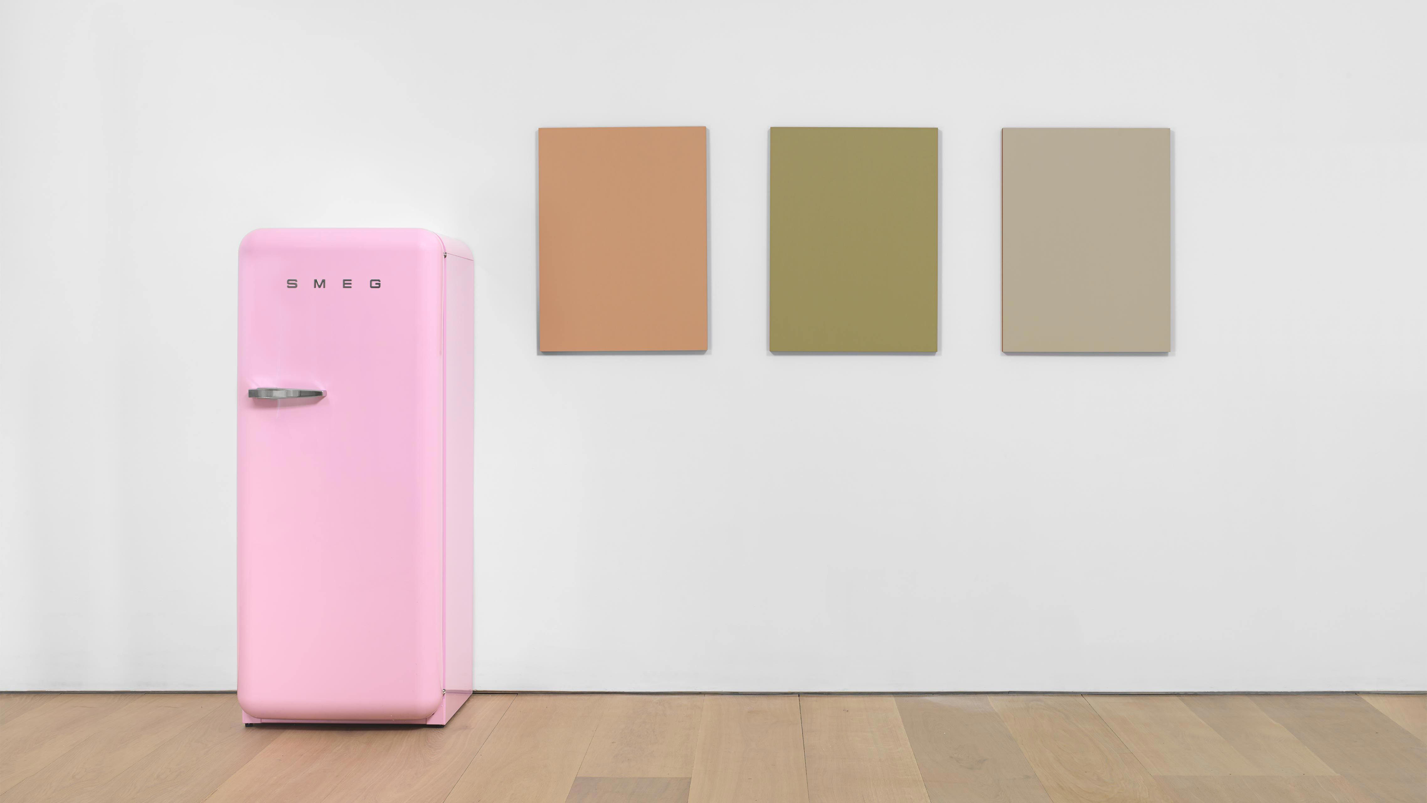 Three paintings and one ]SMEG FAB28UBLR1 Fifties Retro Style refrigerator by Sherrie Levine, titled Pink SMEG Refrigerator and Renoir Nudes, dated 2016.
