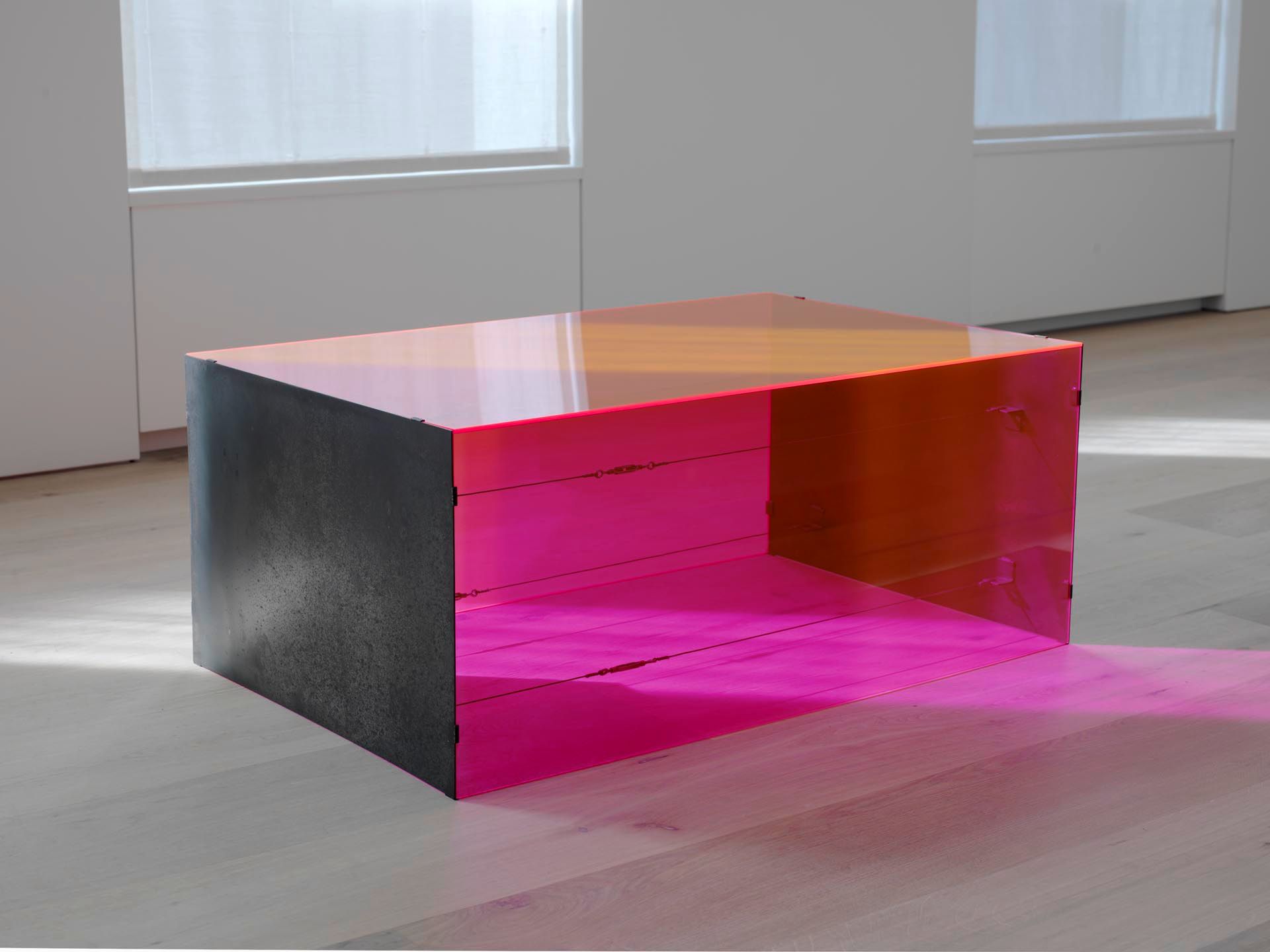 A stainless steel and red fluorescent acrylic sheets untitled sculpture by Donald Judd, dated 1965.