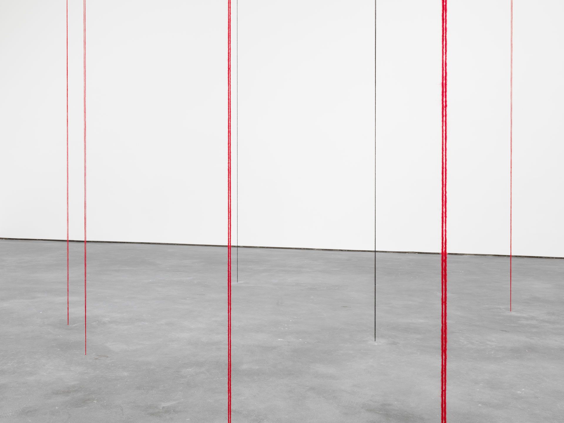 A detail from a sculpture by Fred Sandback, titled Untitled (Sculptural Study, Twenty-two-part Vertical Construction), circa 1991 to 2016.
