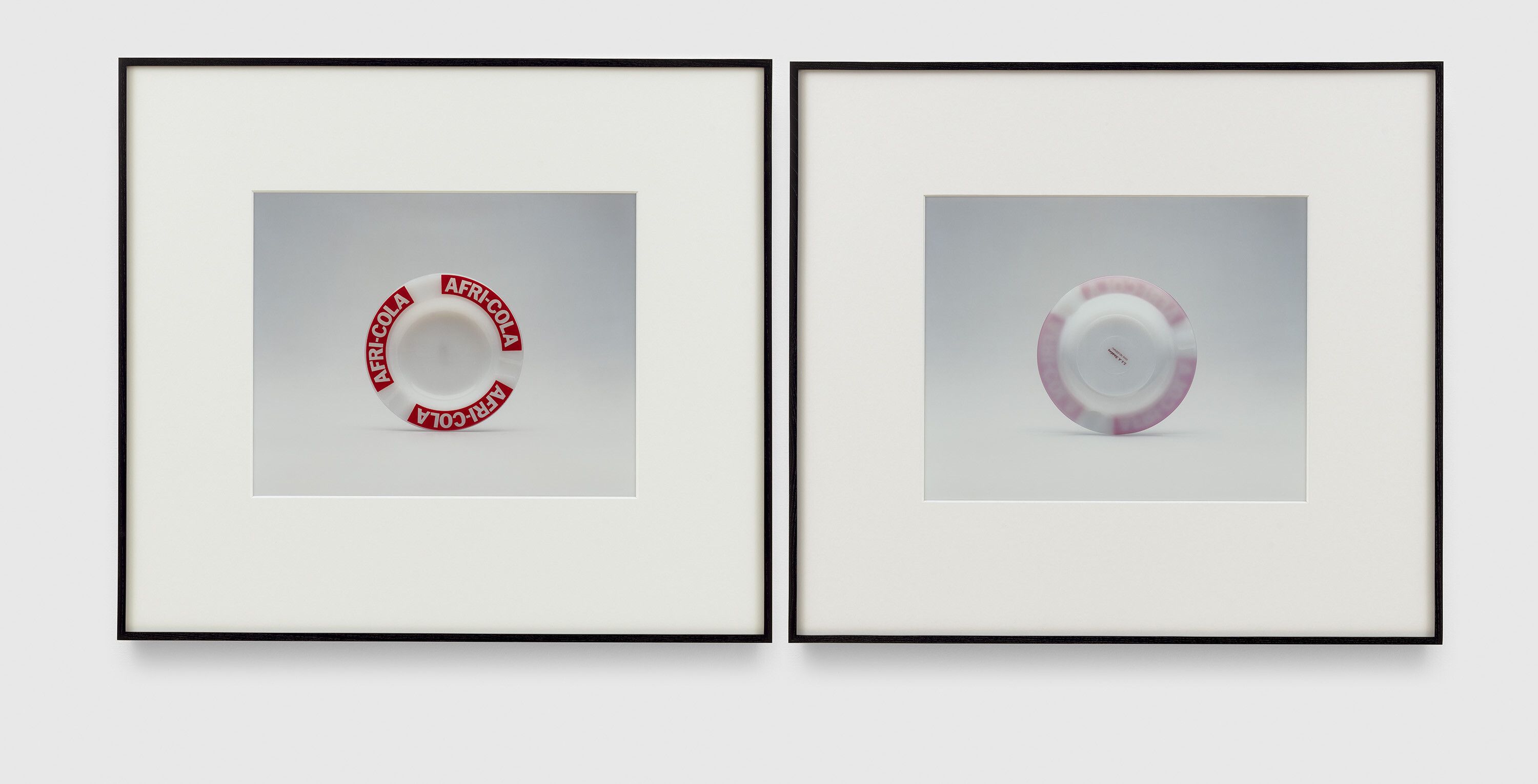 A photograph by Christopher Williams, titled Afri-Cola (Ashtray), Manufacturer: E. & A. Böckling, 6956 Neudenau, Germany, Date of Production 1980 - 1989, Photography by the Douglas M. Parker Studio, Los Angeles, California, November 26, 2005. (Nr. 1 & 2), dated 2005.
