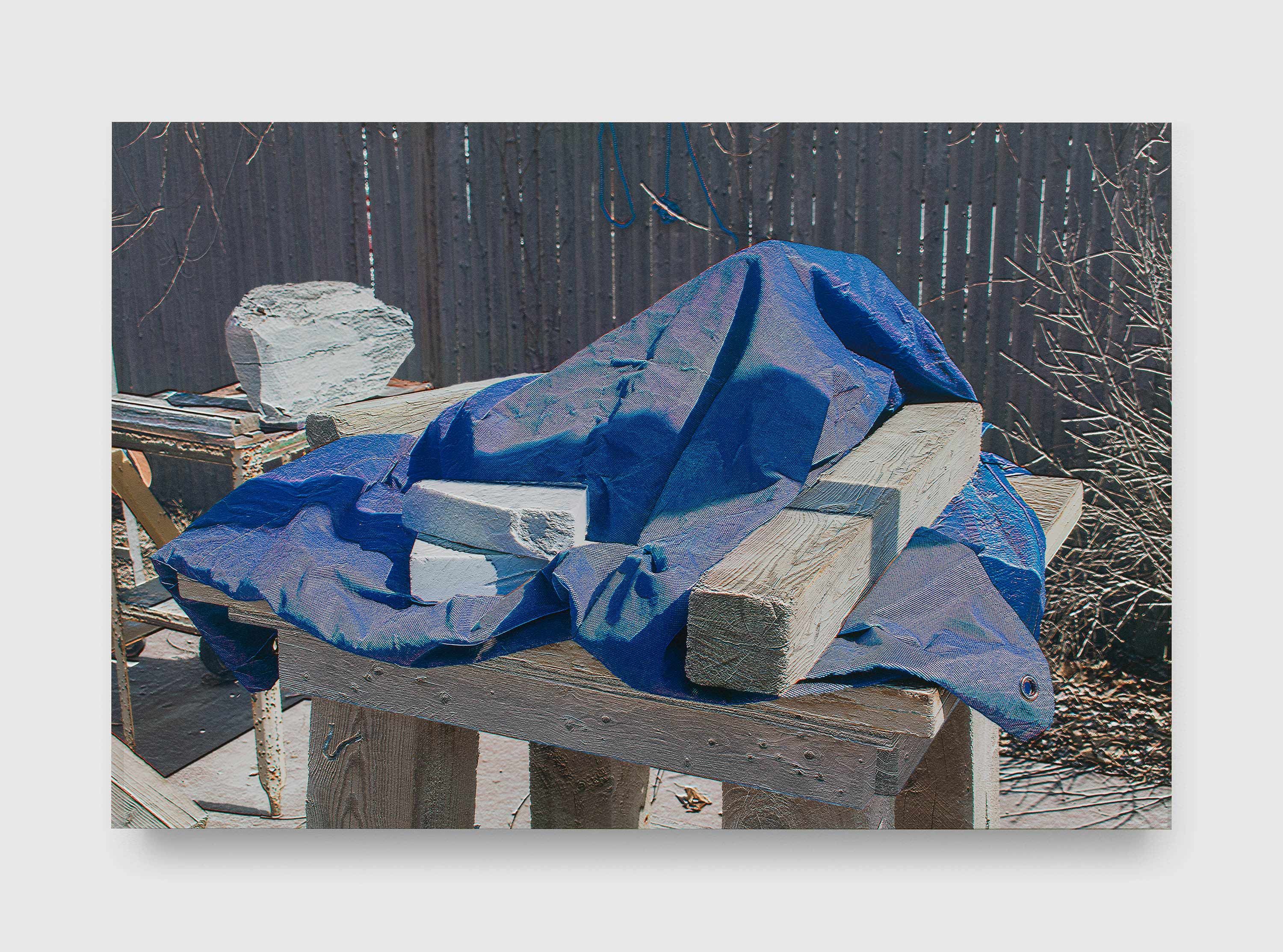 A photograph by James Welling, titled Table with Tarpaulin, dated in 2021 and 2023.