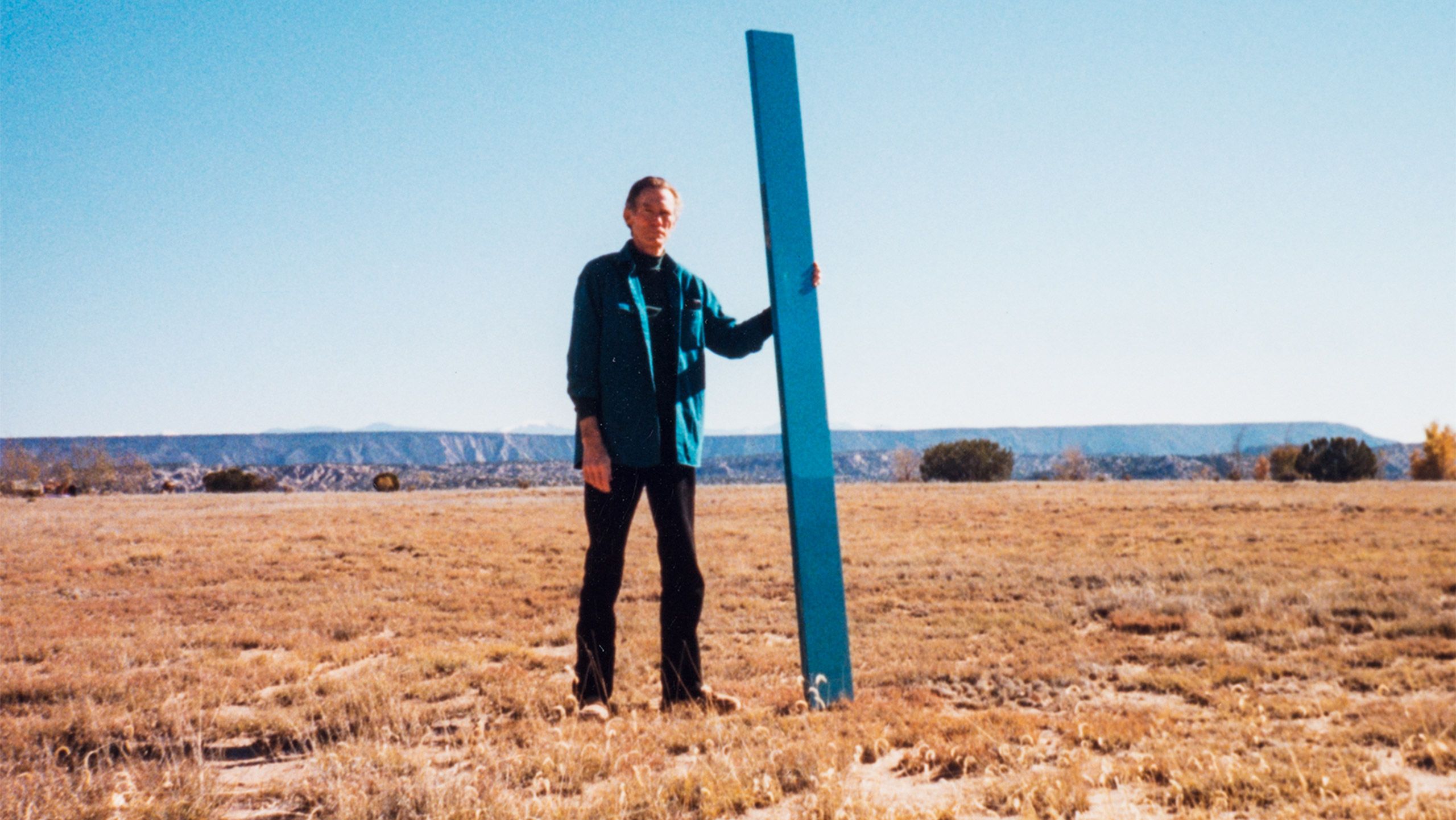 A photo of John McCracken near his studio in New Mexico, dated 1996. copyright The Estate of John McCracken. 