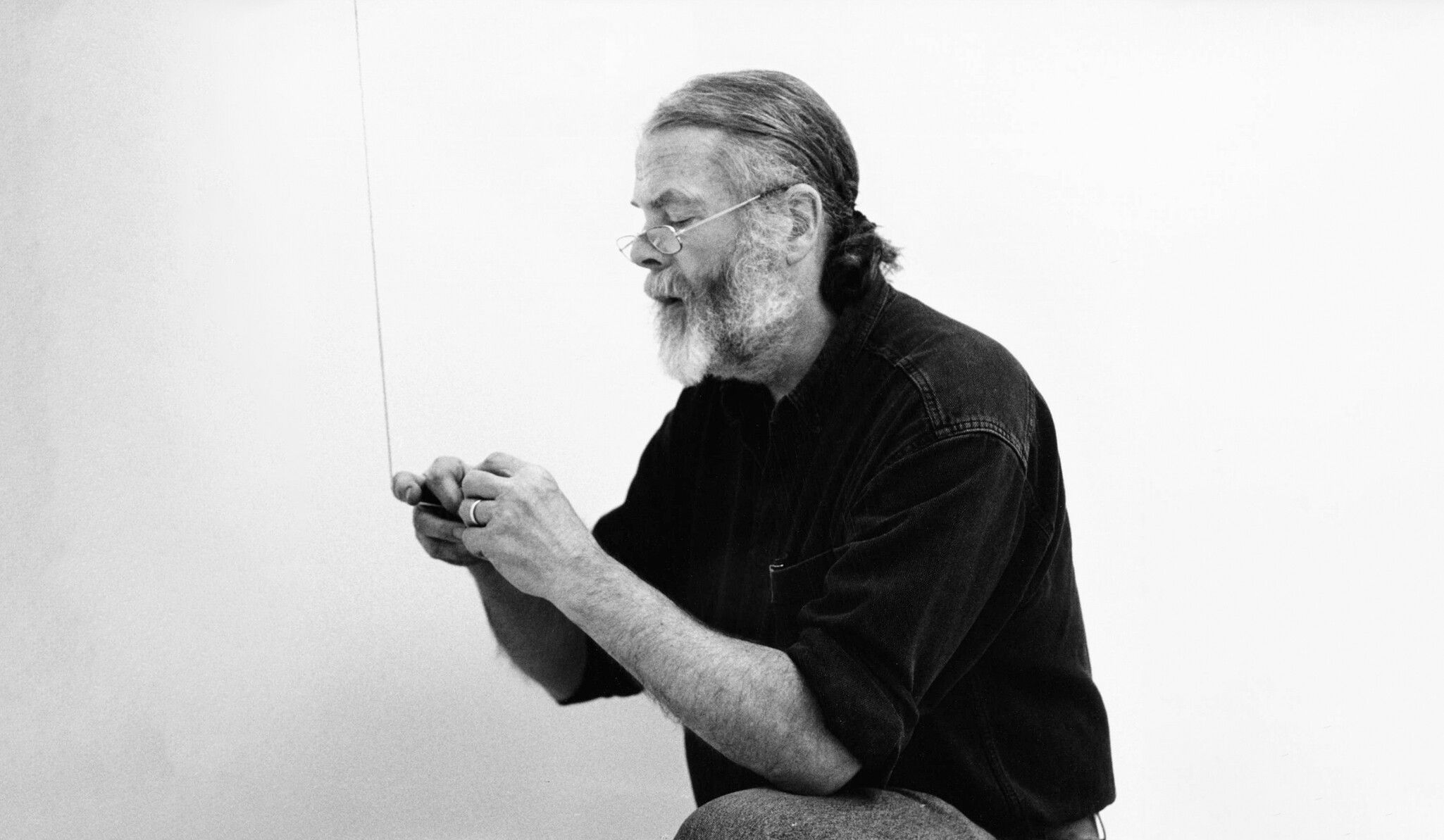 A Photo by Thomas Cugini, of Fred Sandback in Zurich