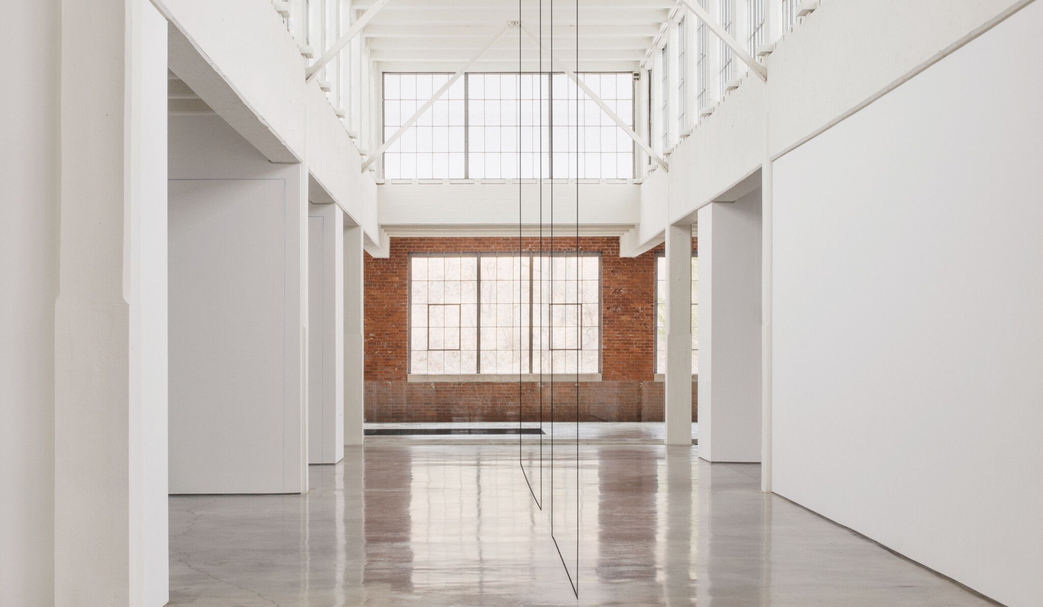 An installation view of a work by Fred Sandback at Dia Beacon