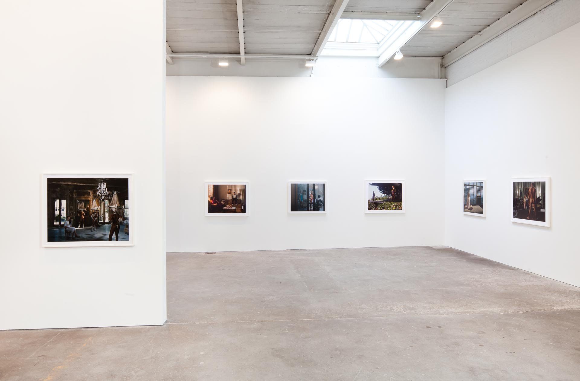 Installation view of the exhibition Philip-Lorca diCorcia: ELEVEN at David Zwirner in New York, dated 2011.
