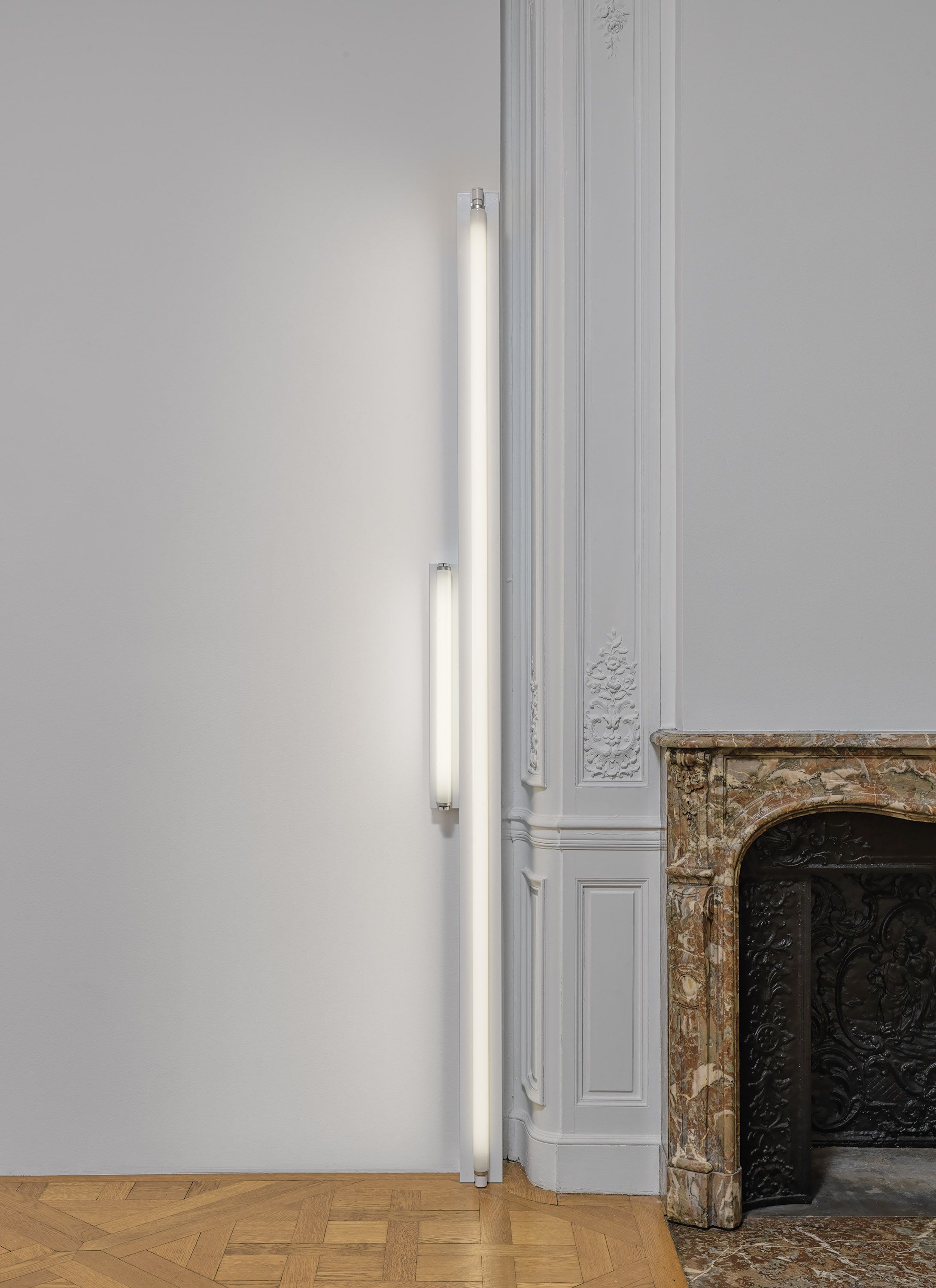 A cool white fluorescent light sculpture by Dan Flavin, called untitled, dated 1967.