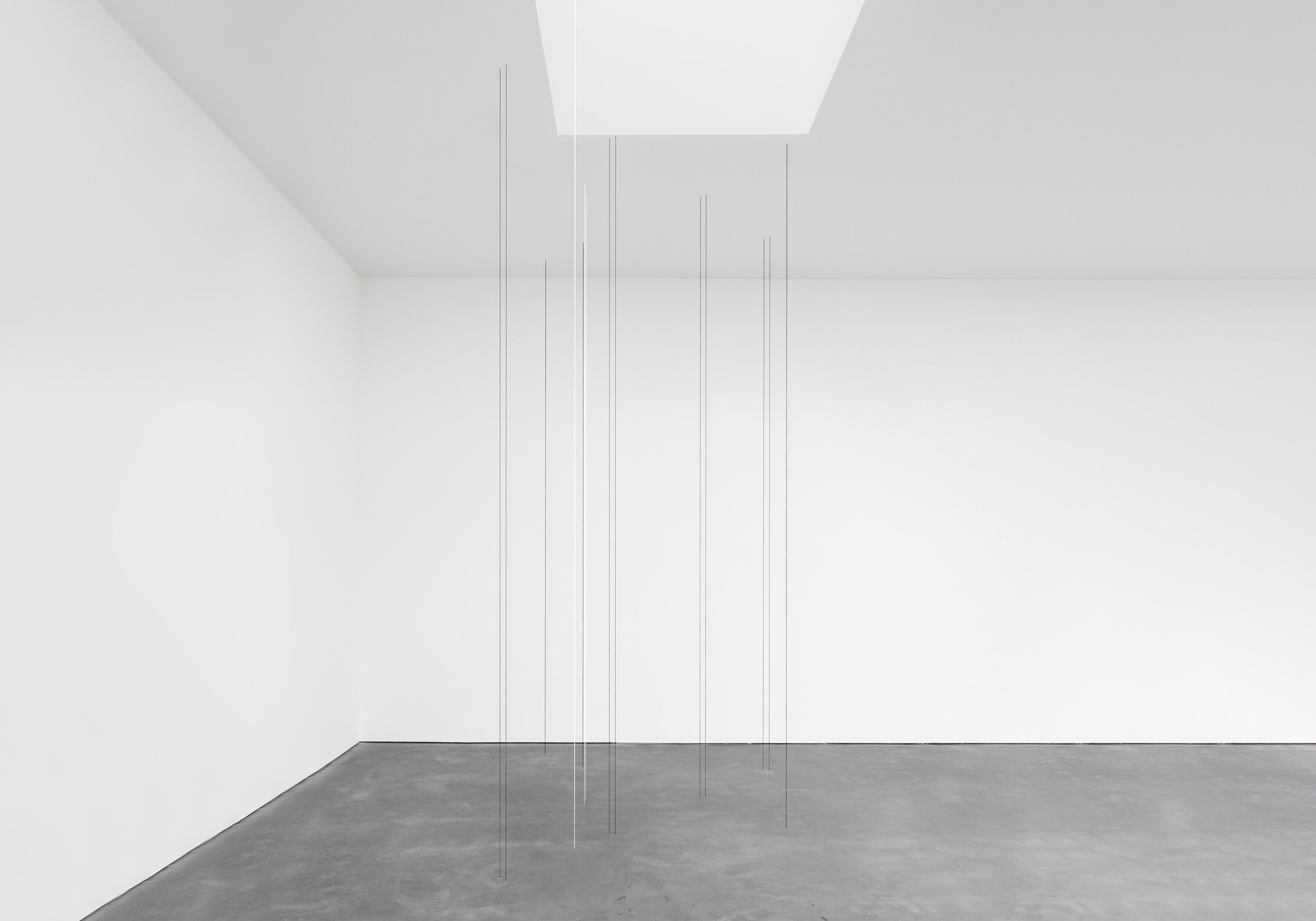 A sculpture by Fred Sandback, called Untitled (Fourteen-part Vertical Construction), dated 1987.