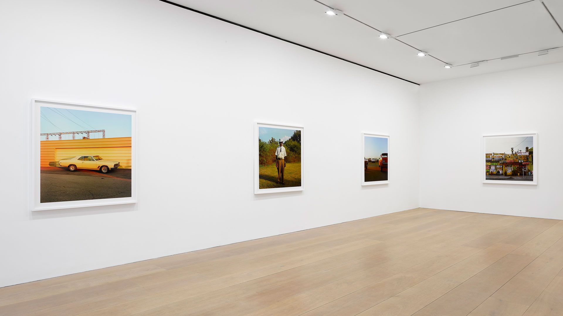 An installation view of William Eggleston's solo exhibition titled William Eggleston: 2 1/4 at David Zwirner, London, in 2019.