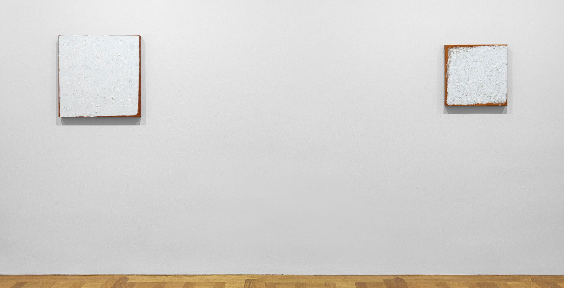 An installation view of an exhibition titled, Robert Ryman: The Last Paintings, at David Zwirner, New York, in 2022.